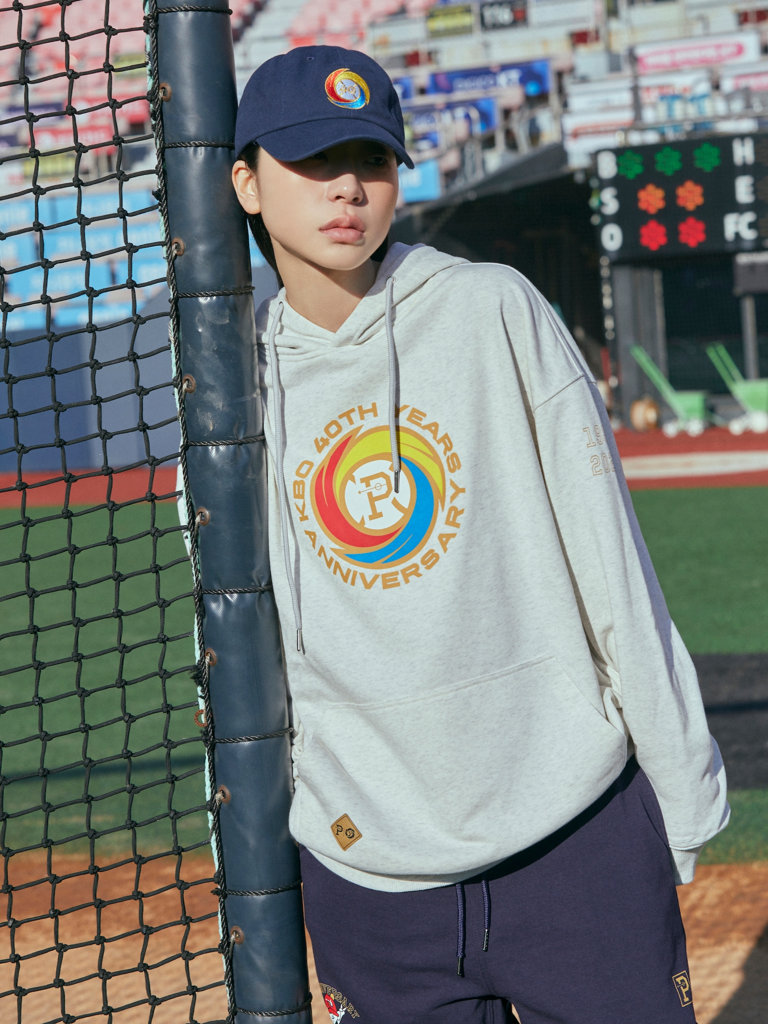 [KREAM 단독] Over The Pitch x KBO The 40th Anniversary Emblem Loose Fit Hoodie Light Melange, [KREAM 단독] Over The Pitch x KBO The 40th Anniversary Emblem Cap Navy 착용 스타일