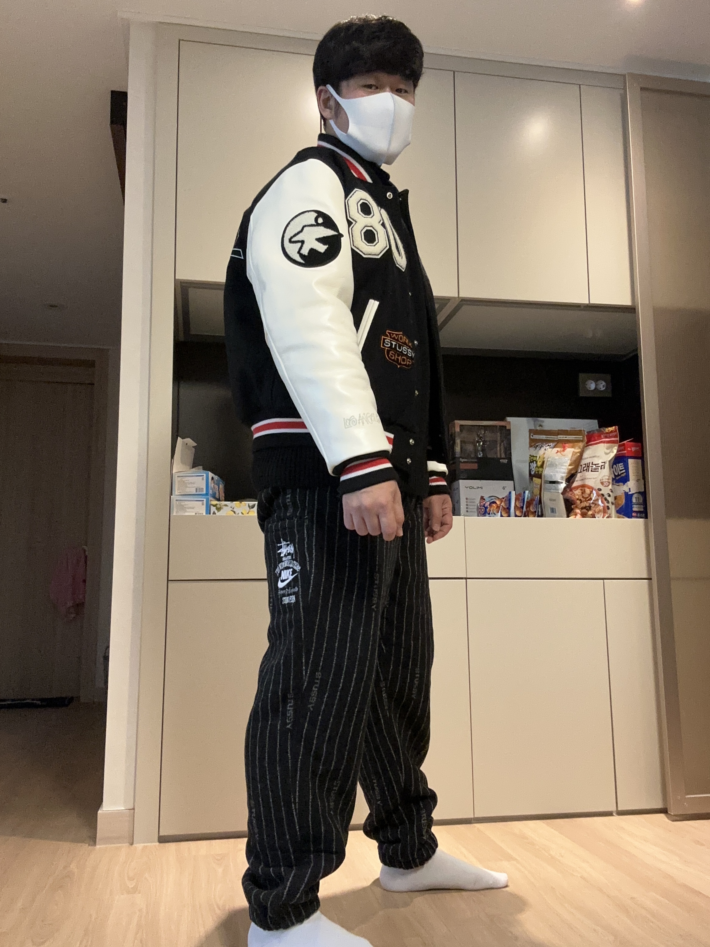 Stussy x Our Legacy x Denim Tears TTL Varsity Jacket Black, Nike x Stussy NRG Striped Wool Pants Black (DR4021-010) 착용 스타일 - 1
