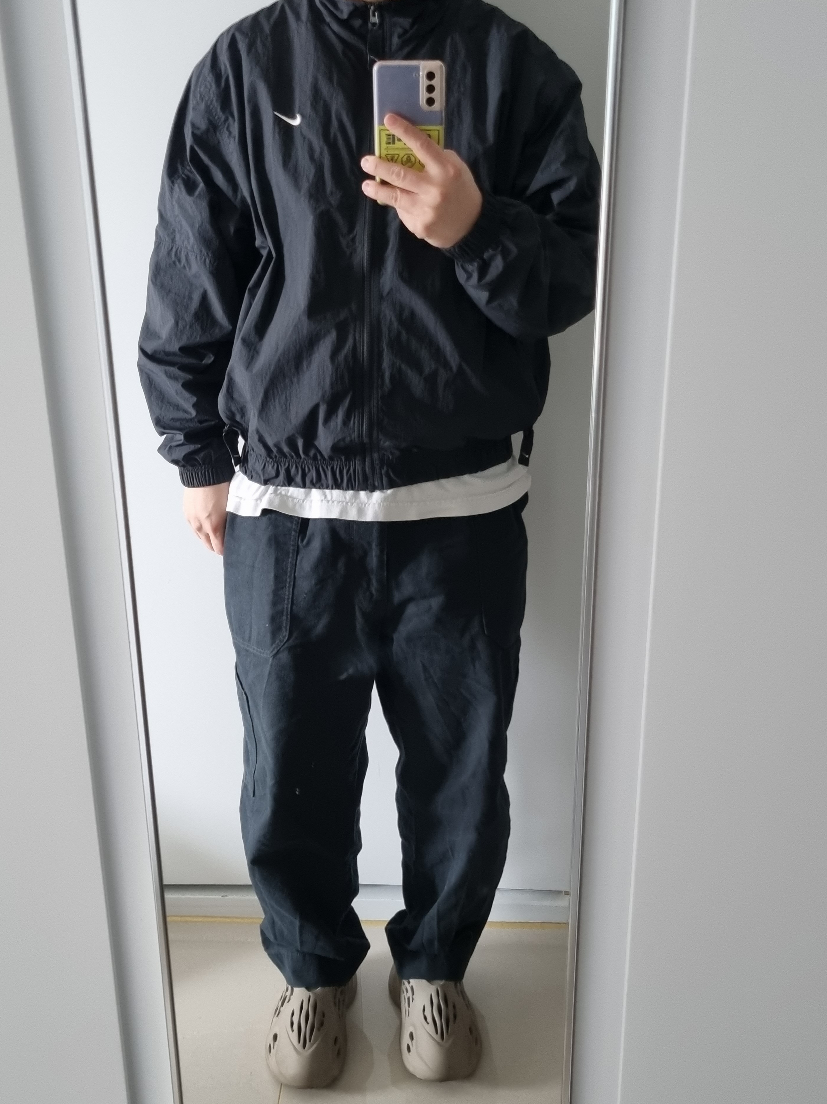 Adidas Yeezy Foam RNNR Stone Sage, Nike NRG Solo Swoosh Woven Track Jacket Black - Asia 착용 스타일