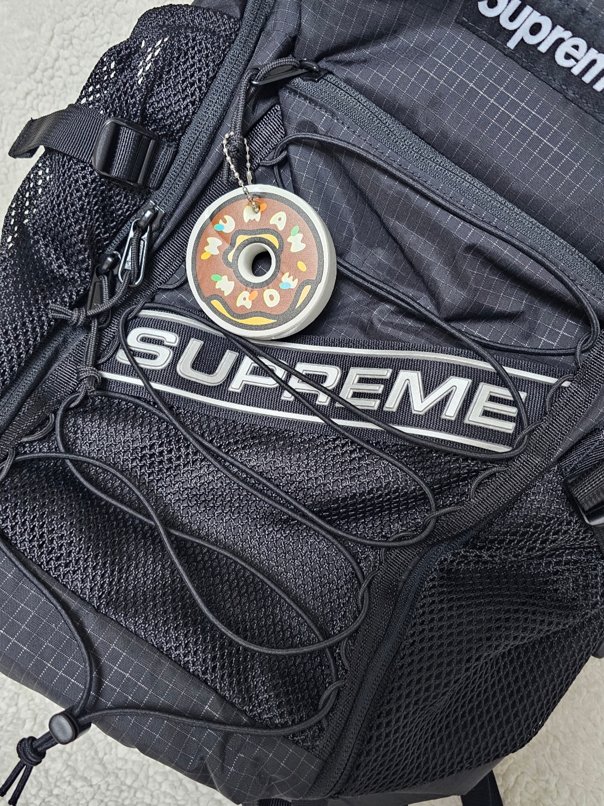 Supreme Backpack Black - 23FW, Human Made x Krispy Kreme Keycharm Brown 착용 스타일