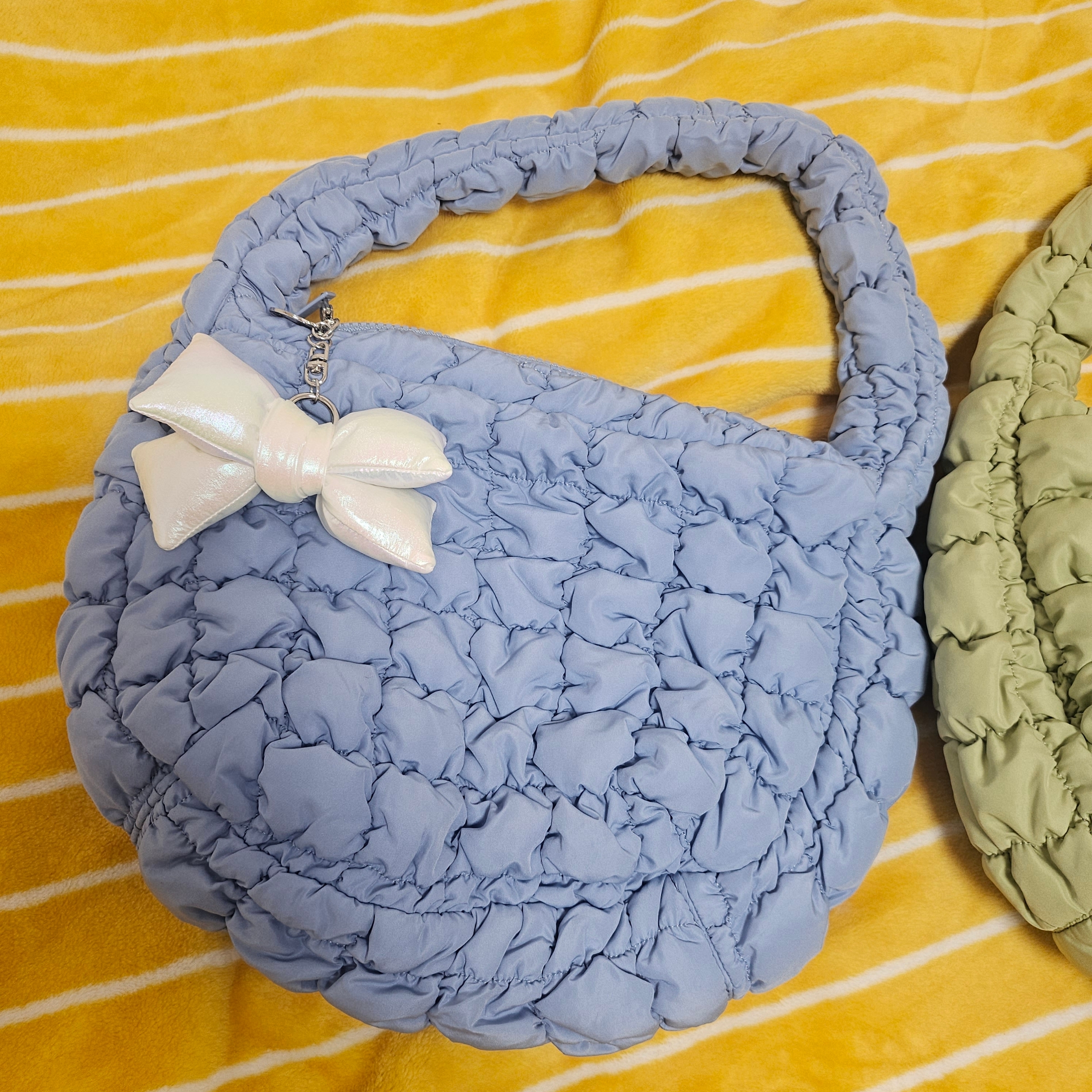 [KREAM 단독] Bloomingtale Padded Ribbon Keyring White, COS Quilted Mini Bag Light Blue 착용 스타일
