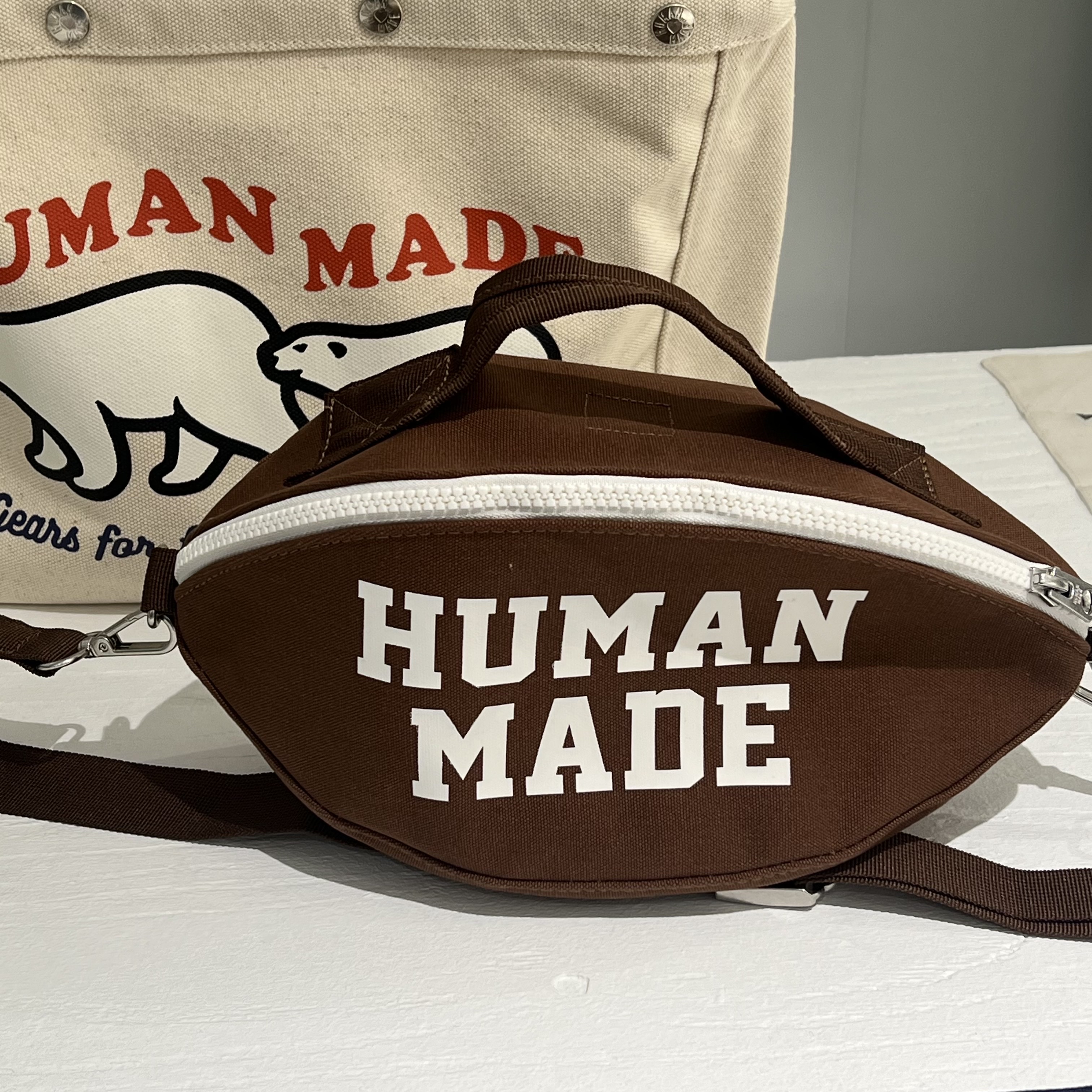 Human Made Rugby Ball Bag Brown 착용 스타일