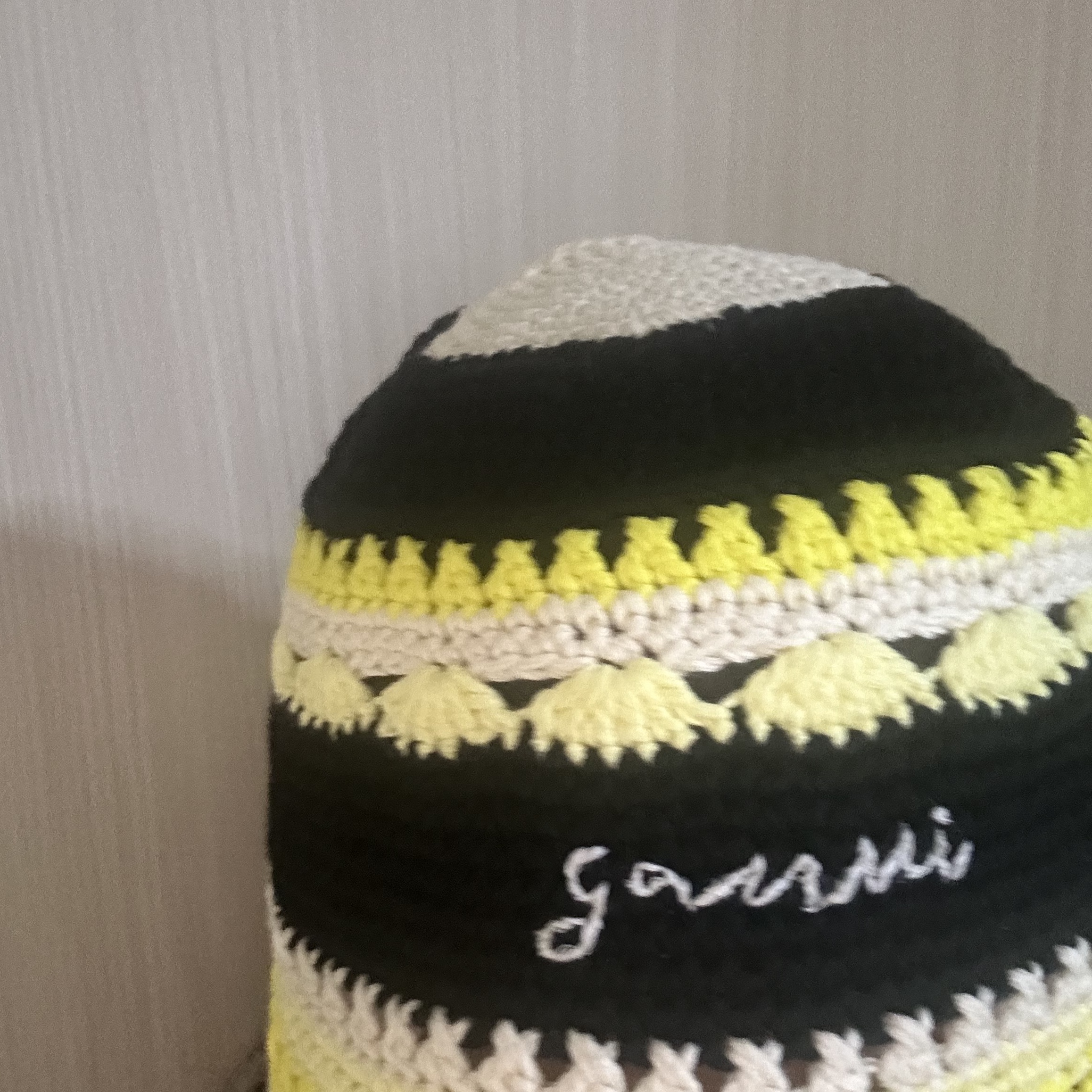 (W) Ganni Crochet Bucket Hat Golden Kiwi 착용 스타일