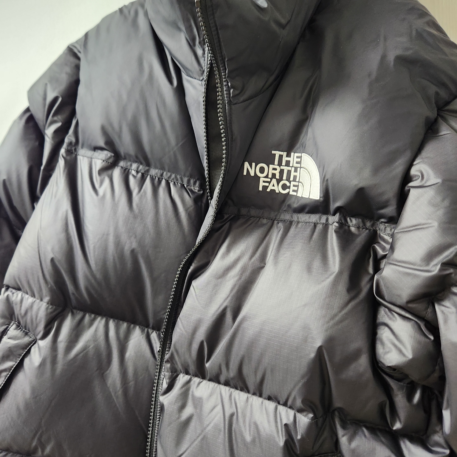 The North Face 1996 Eco Nuptse Jacket Black 착용 스타일