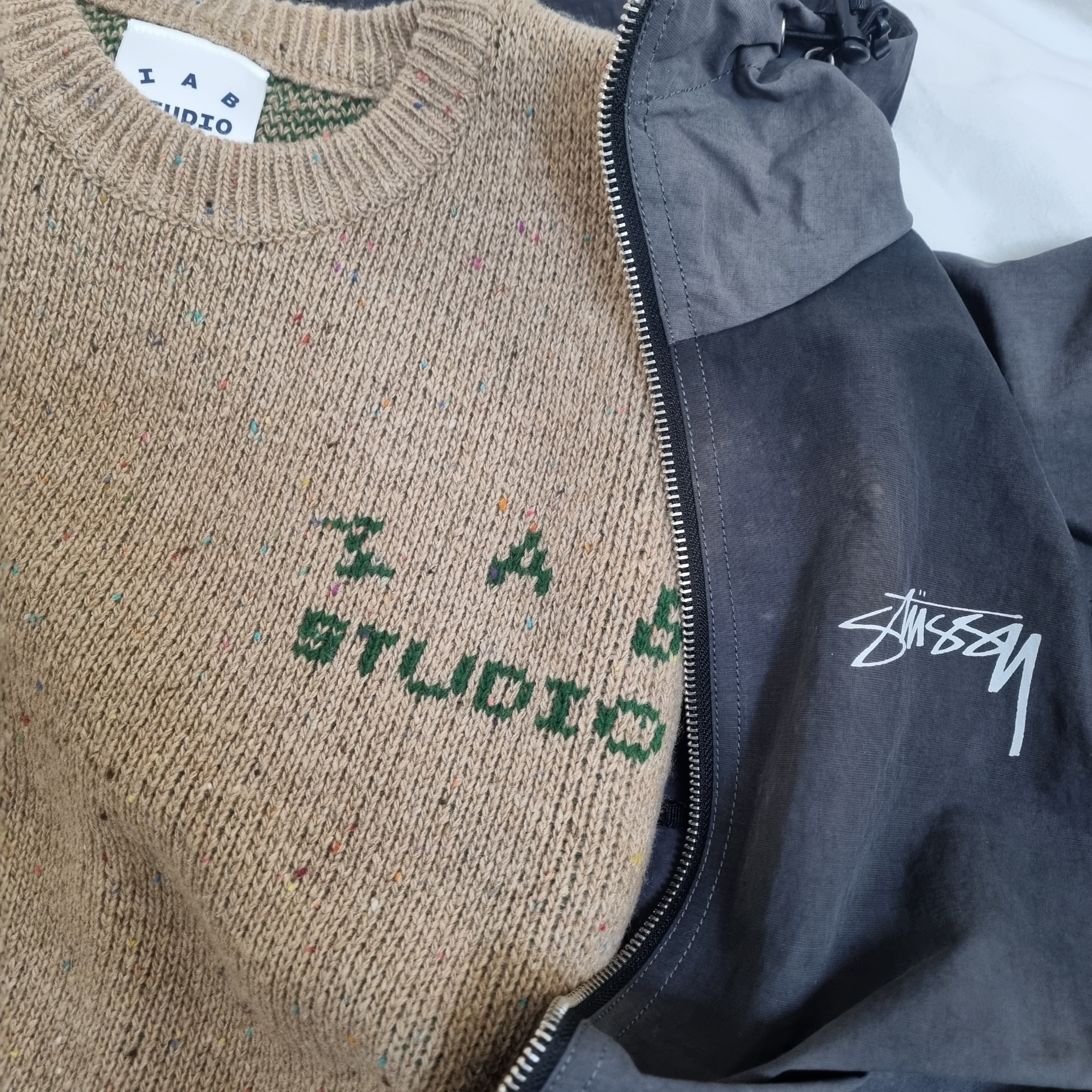 Stussy Wave Dye Beach Shell Jacket Black, IAB Studio x Saddler Haus Knit Basil 착용 스타일