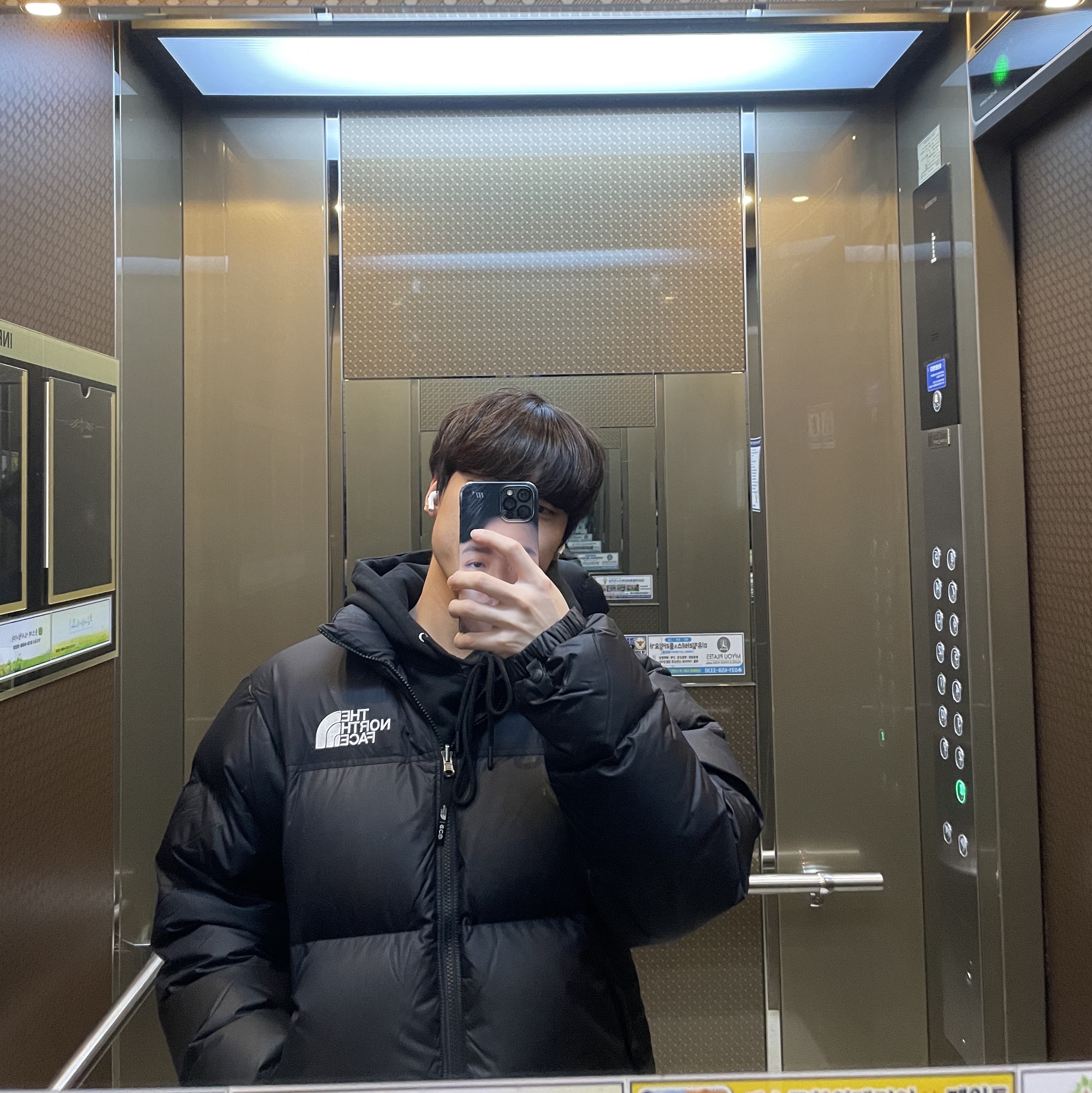 The North Face 1996 Eco Nuptse Jacket Black 착용 스타일