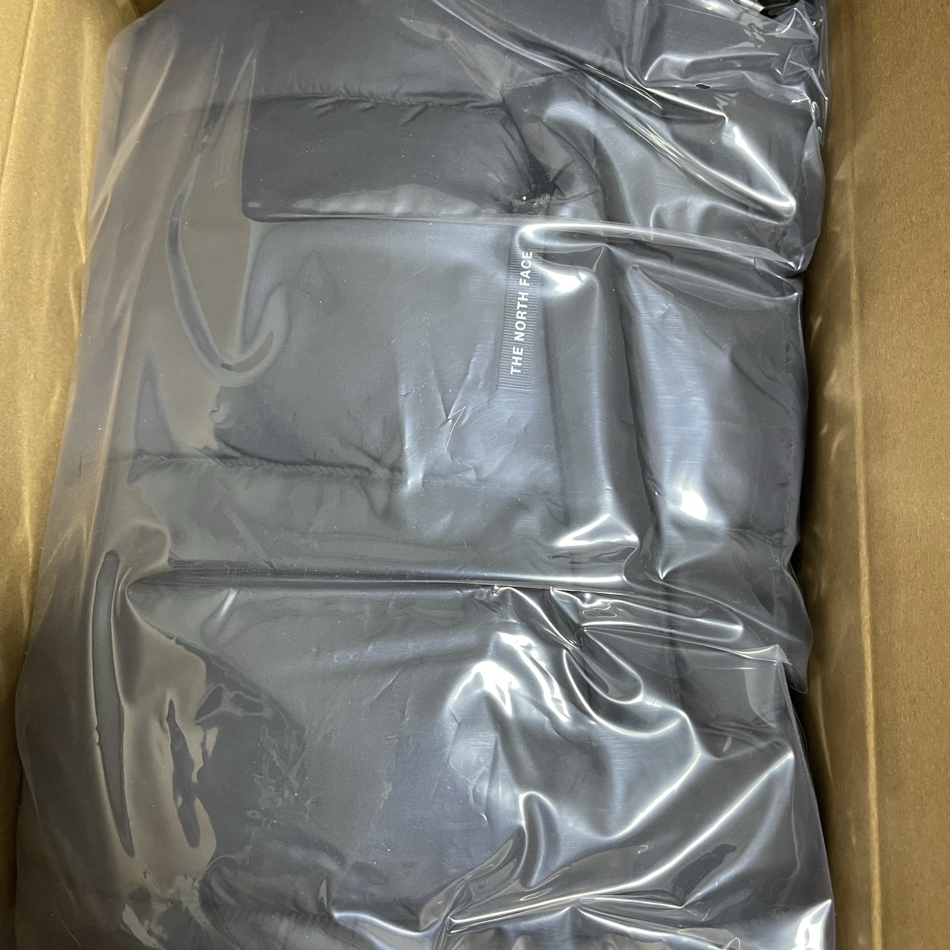 The North Face New Puffy Vest Black 착용 스타일