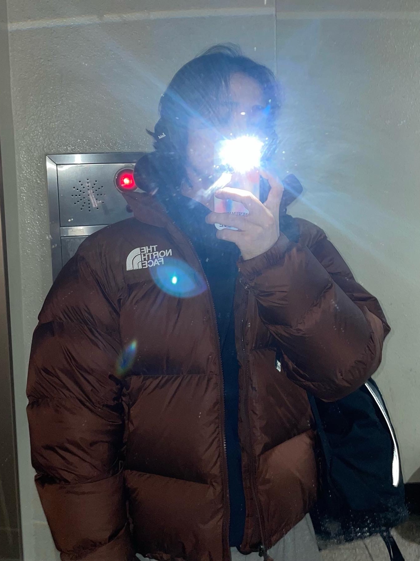 The North Face 1996 Retro Nuptse Jacket Dark Oak 착용 스타일