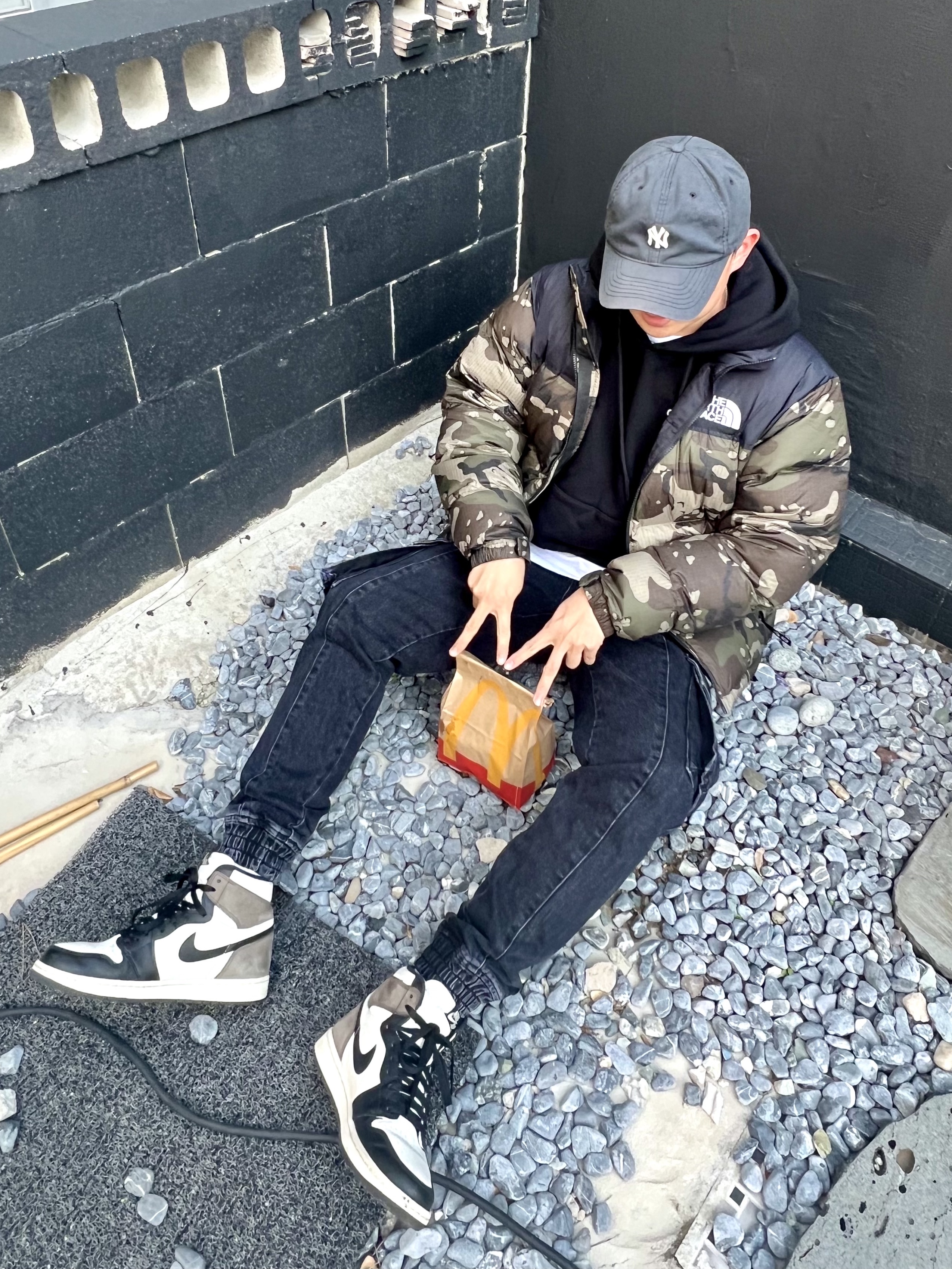 The North Face 1996 Novelty Nuptse Jacket Woodland Camo, Juun.J Tapered Denim Cargo Jogger Pants Black - SS23 착용 스타일