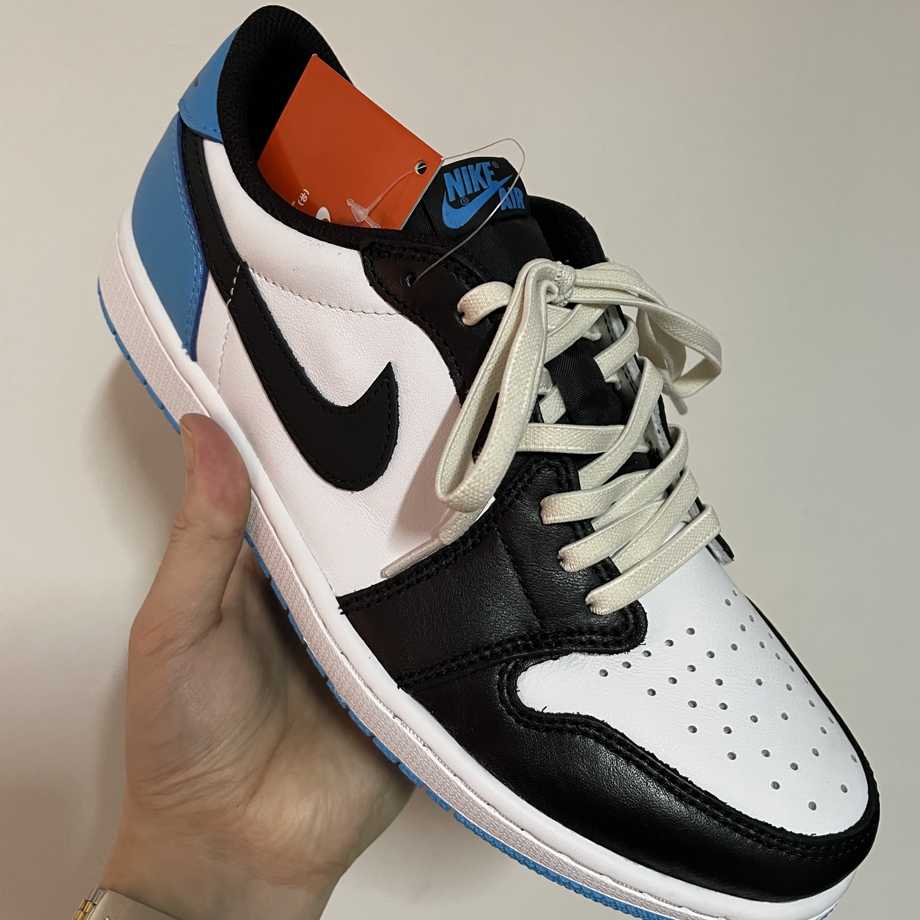 Jordan 1 Retro Low OG Black and Dark Powder Blue, Nike NRG Solo Swoosh Fleece Pants Black White - Asia 착용 스타일 - 1