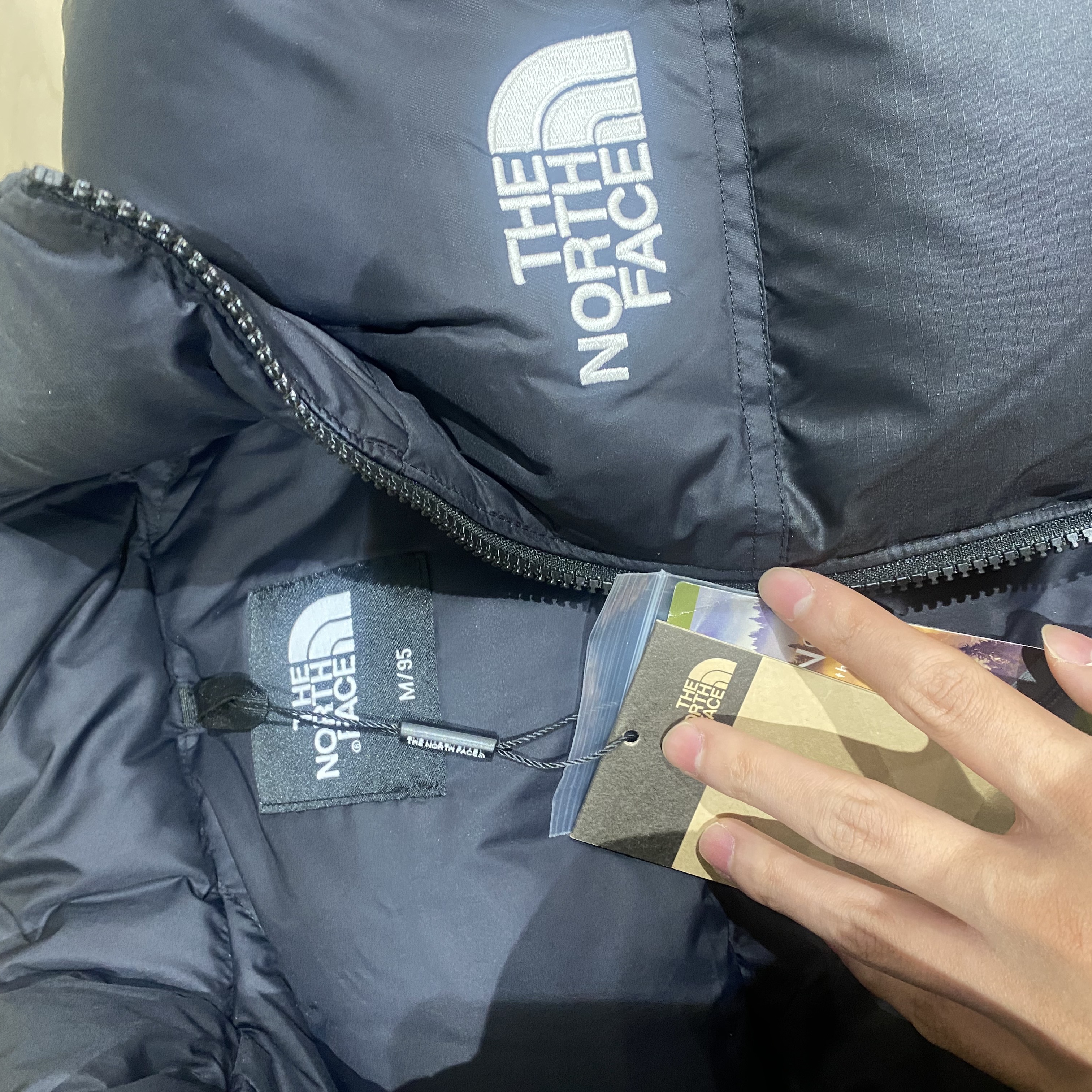 The North Face 1996 Eco Nuptse Jacket Black 착용 스타일