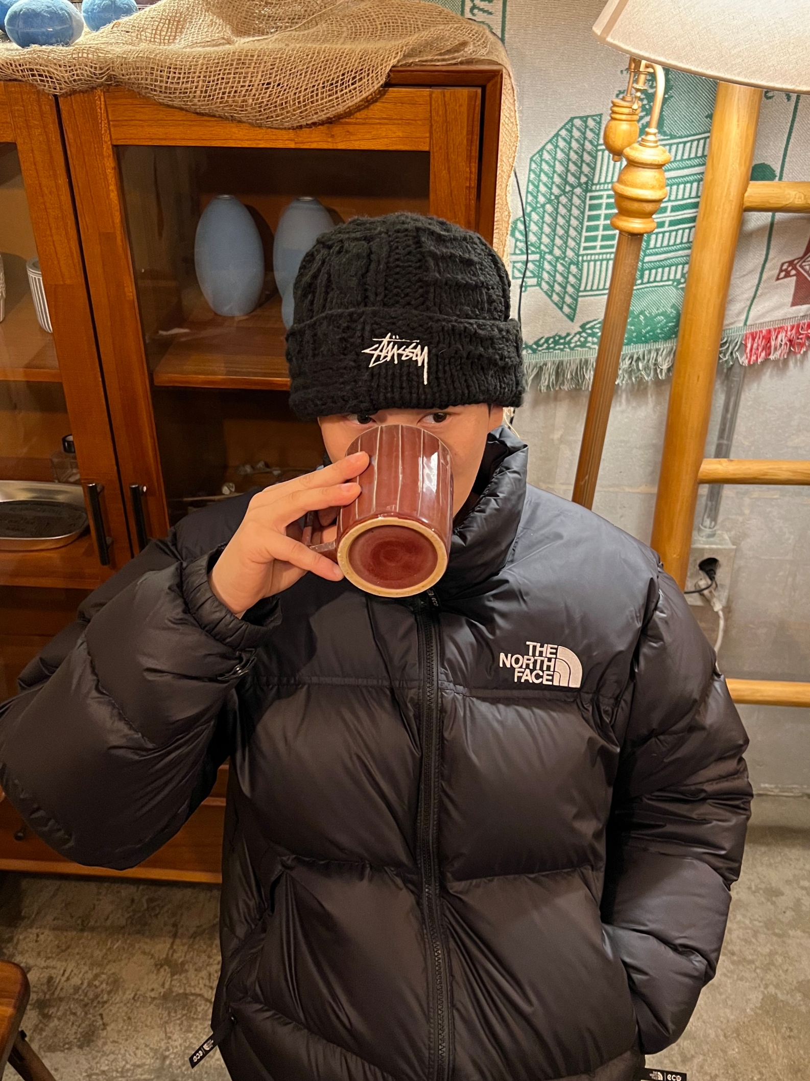 The North Face 1996 Eco Nuptse Jacket Black, Stussy Knit Patchwork Beanie Black 착용 스타일 - 3