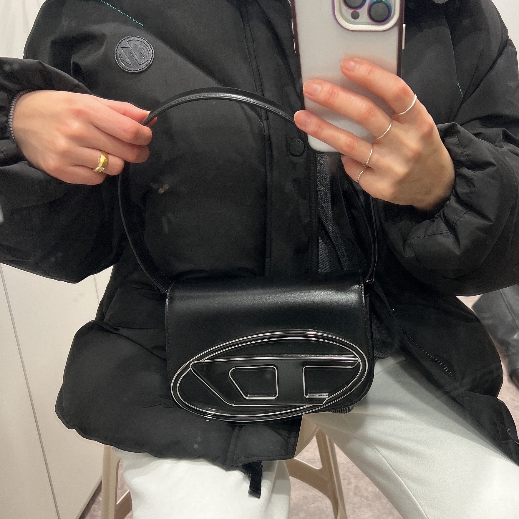 Diesel 1DR Shoulder Bag in Nappa Leather Black, Zara x Ader Error Oversize Puffer Jacket Black 착용 스타일