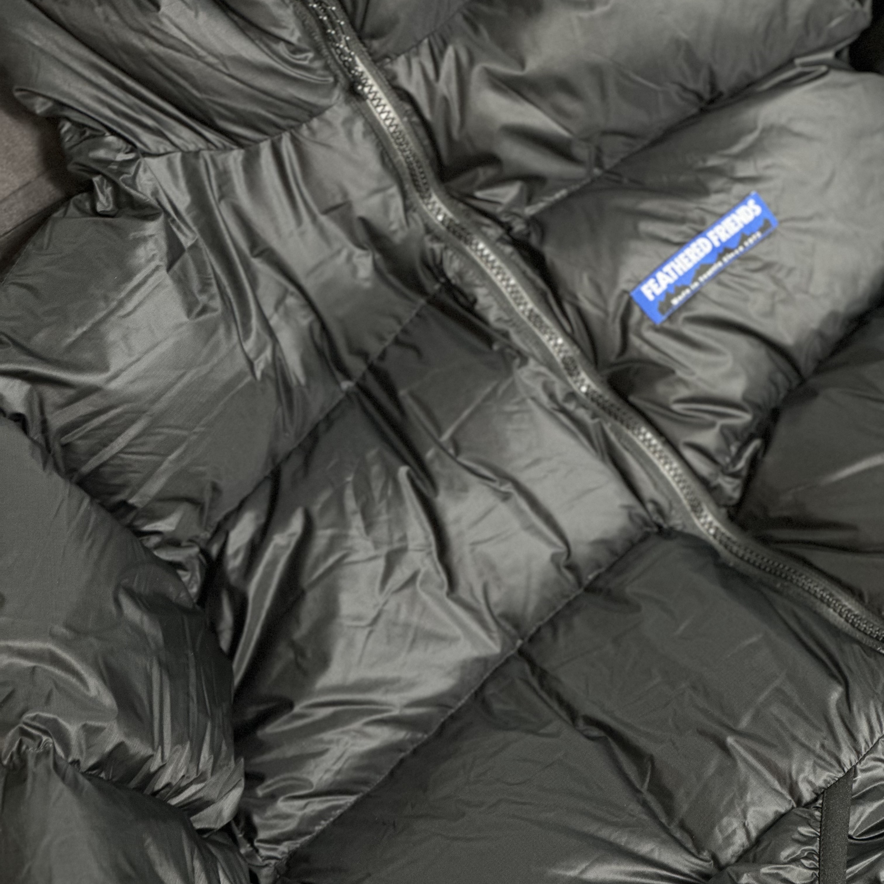 Feathered Friends Helios Hooded Down Jacket Black 착용 스타일
