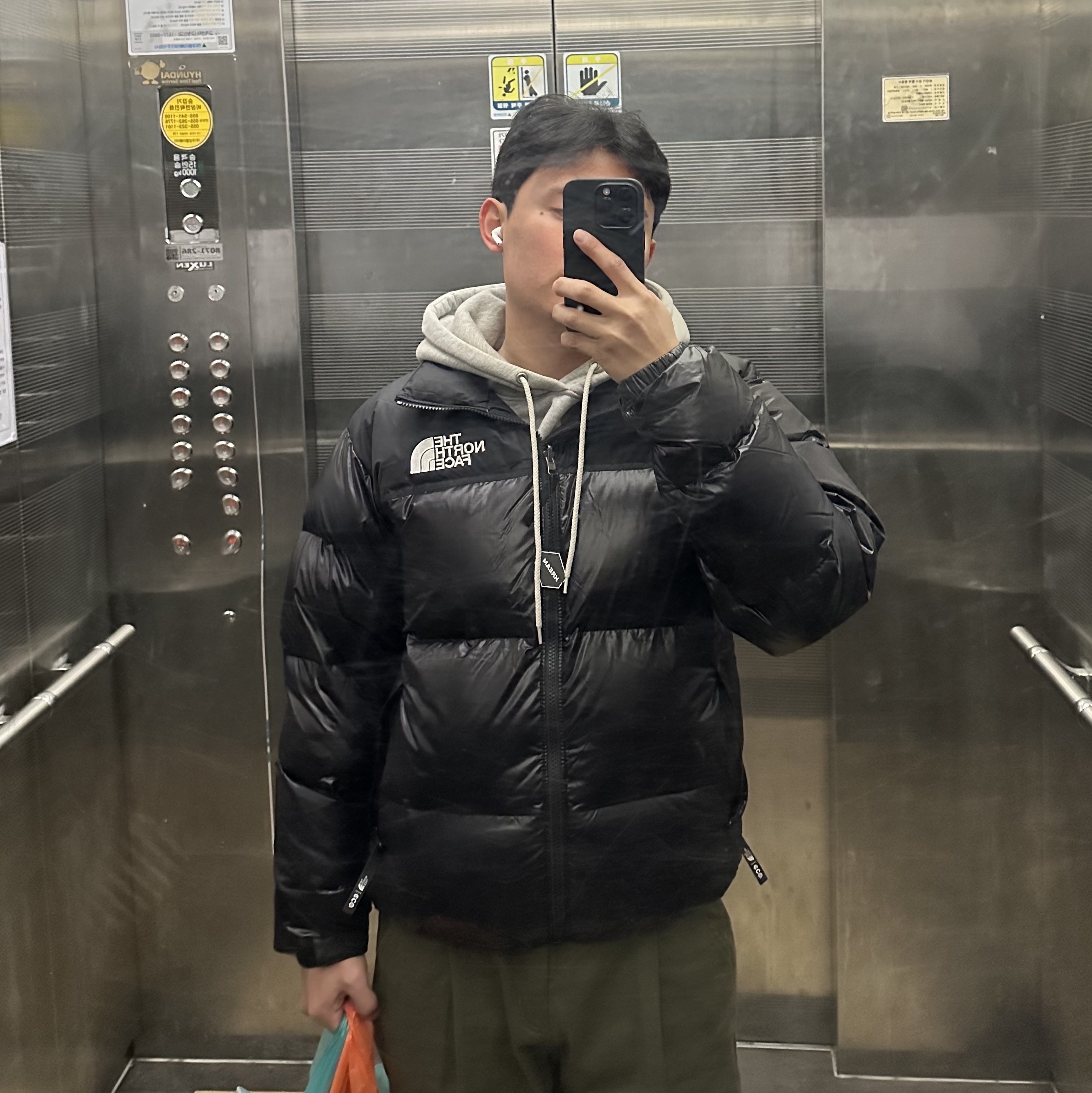 The North Face 1996 Eco Nuptse Jacket Real Black 착용 스타일