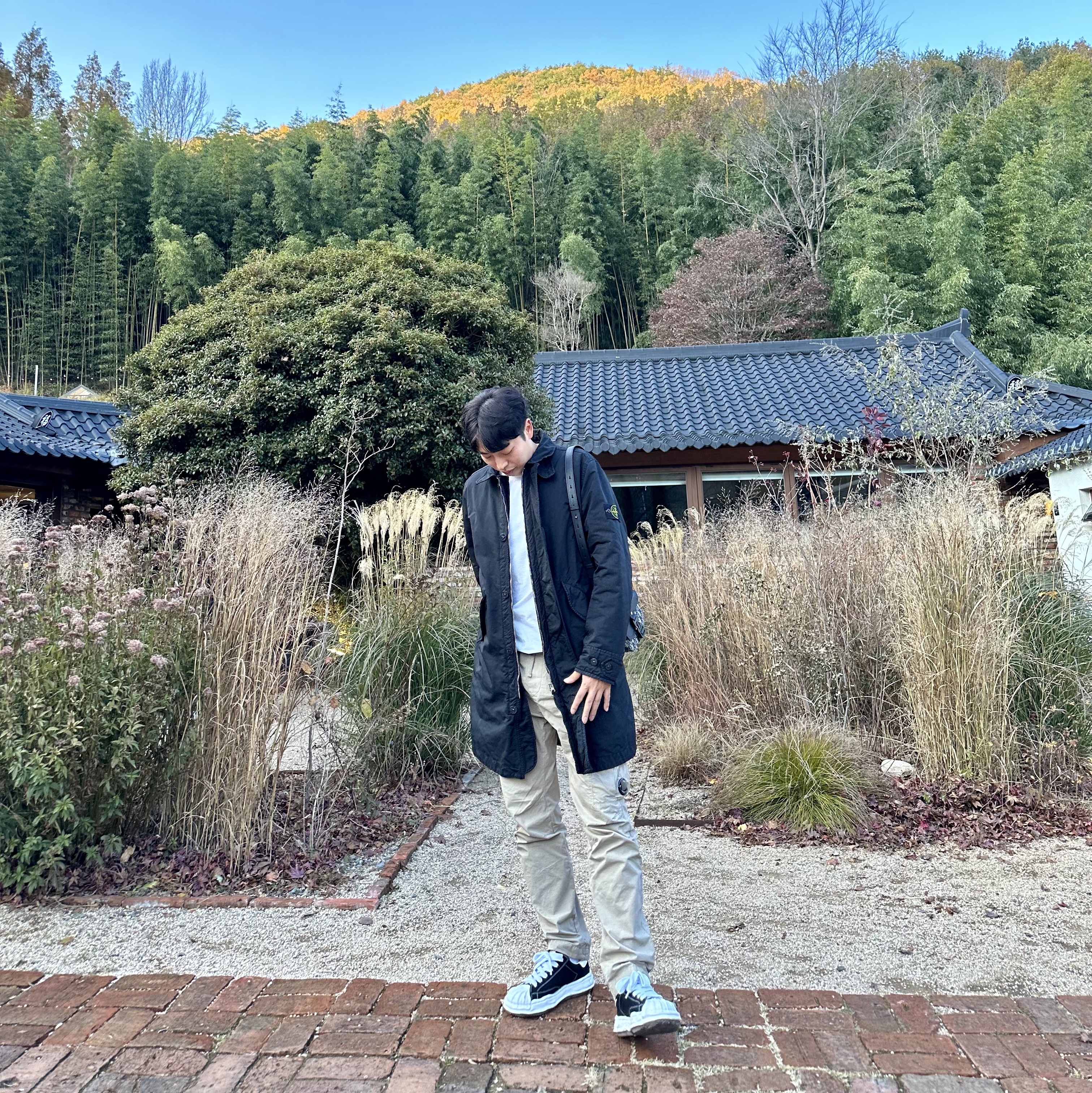 Stone Island x DSM David-TC Heavy Coat Black - 23FW, C.P. Company Micro Reps Track Pants Cobblestone Brown - 23SS 착용 스타일