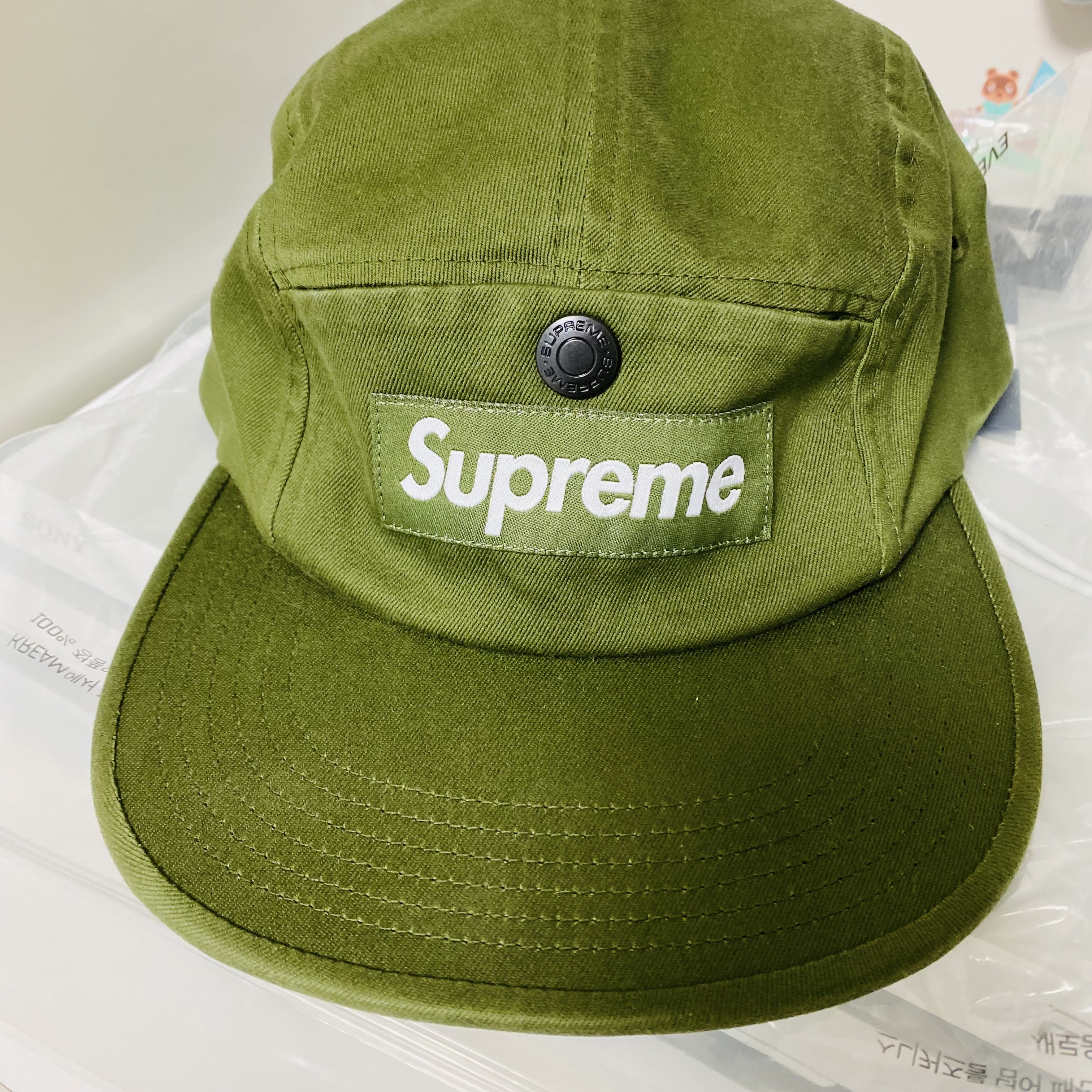 Supreme Snap Pocket Camp Cap Olive - 23FW 착용 스타일