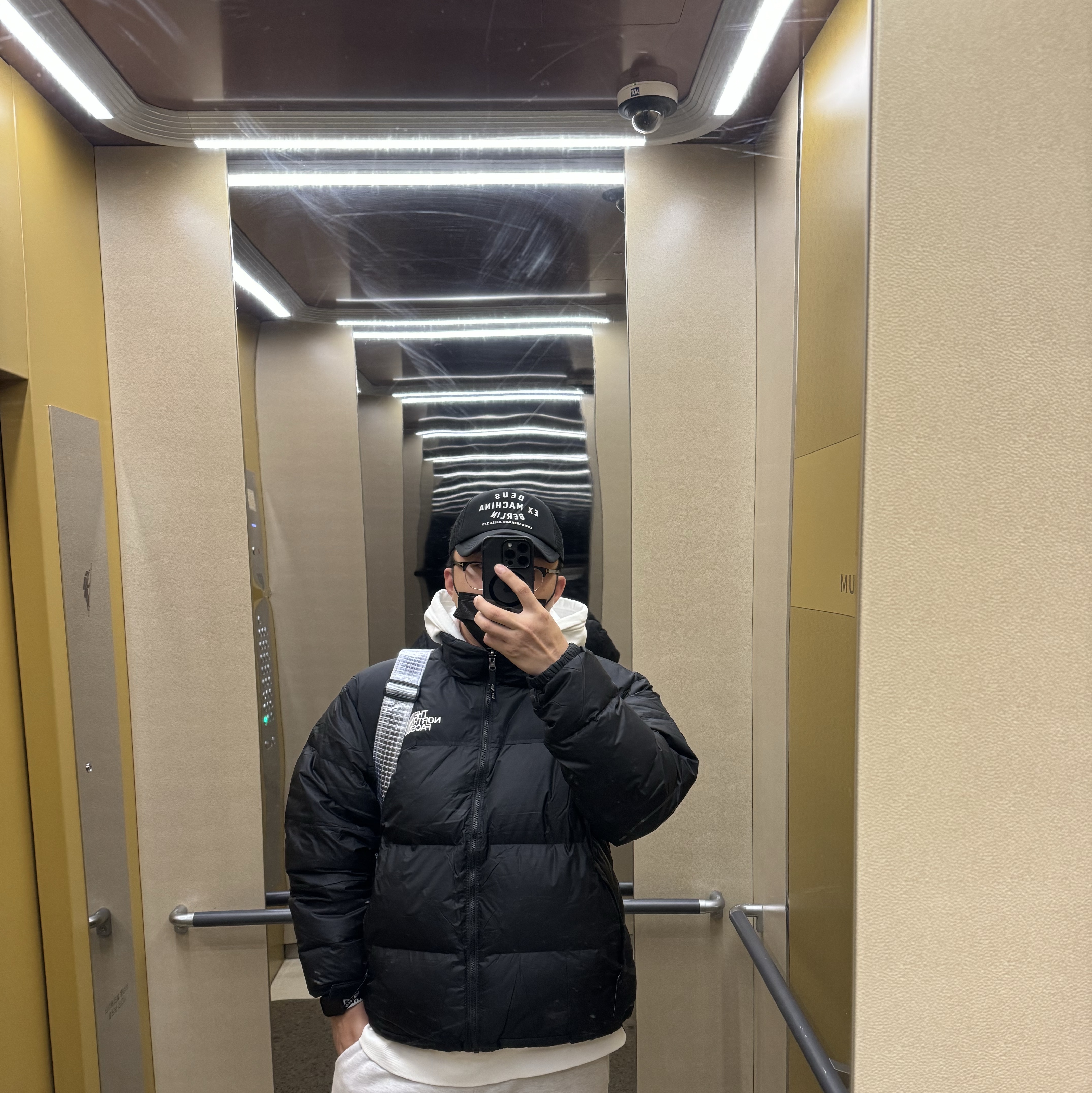 The North Face 1996 Retro Nuptse Jacket Black, Diesel S-Macs-Hood-L4 Hoodie with Planet Logo Print White 착용 스타일