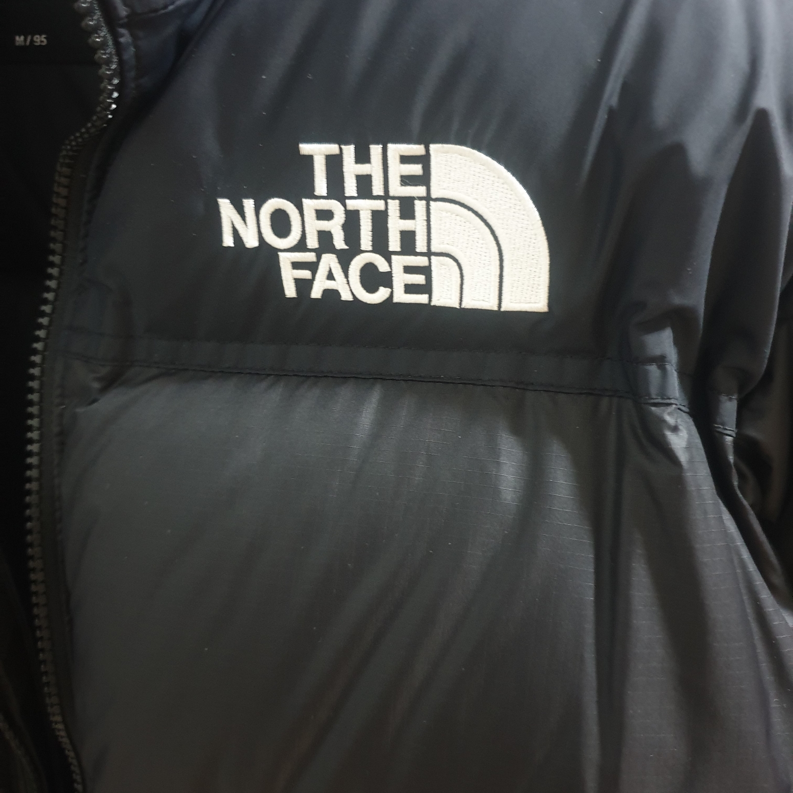 The North Face 1996 Eco Nuptse Jacket Black 착용 스타일