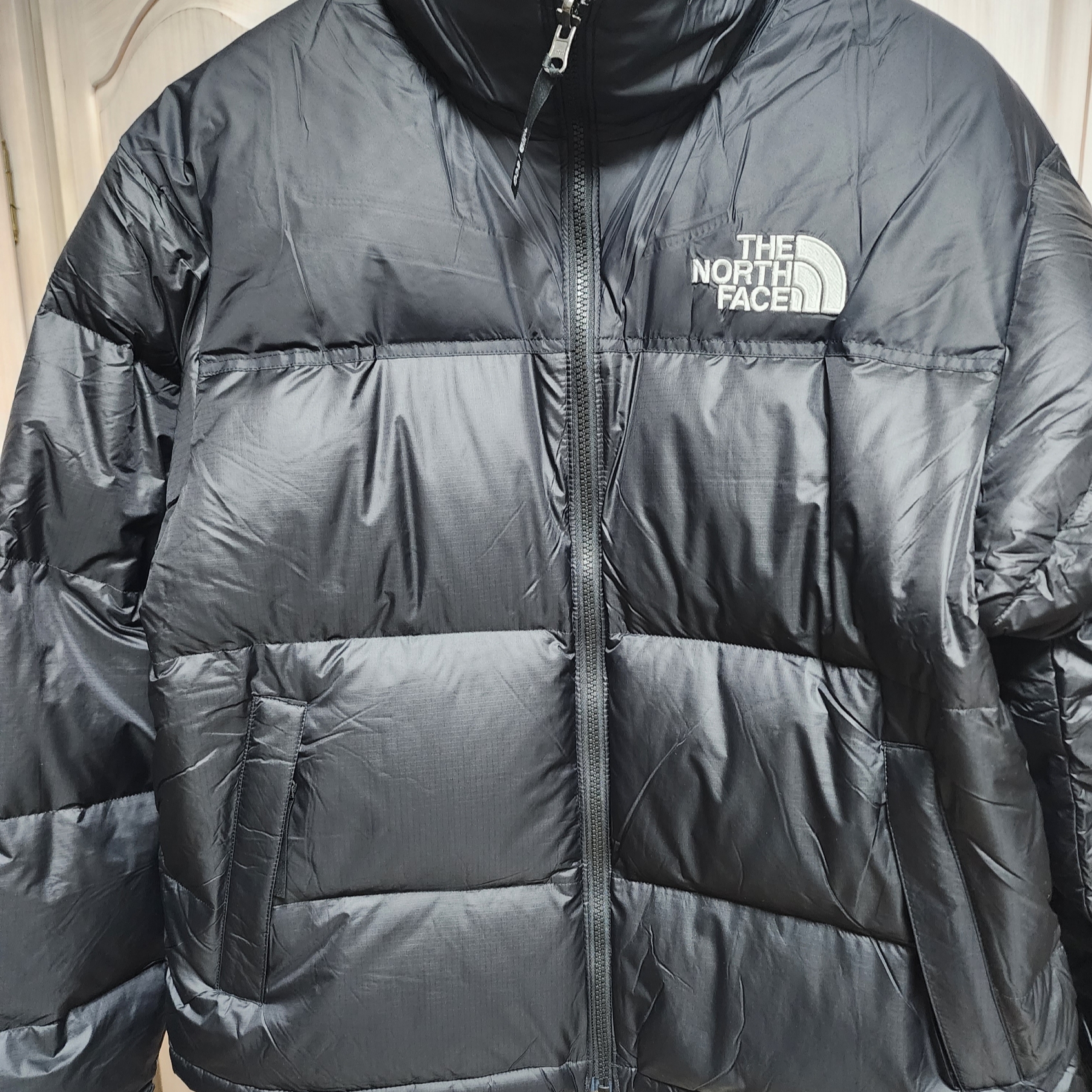 The North Face 1996 Eco Nuptse Jacket Black 착용 스타일