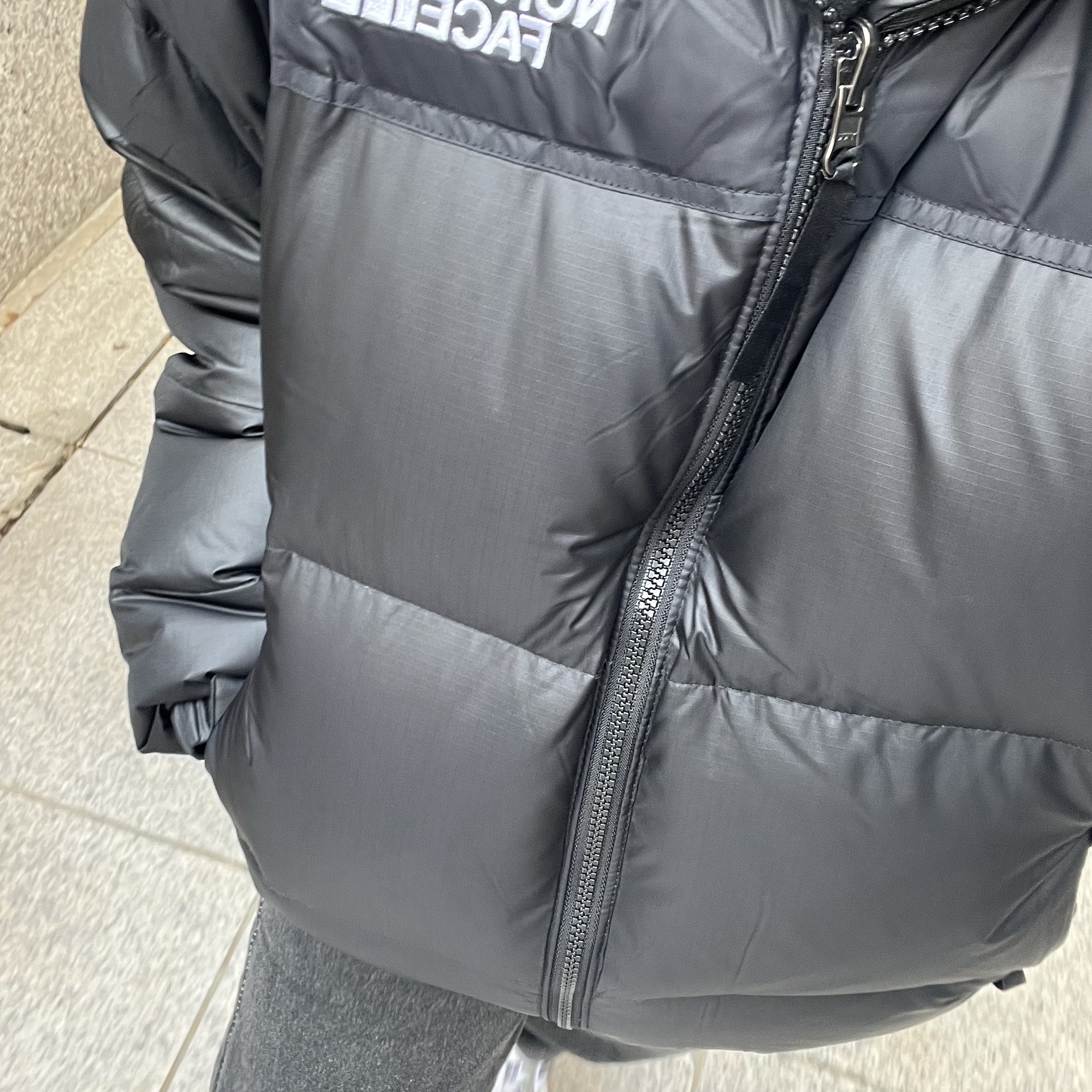 The North Face 1996 Eco Nuptse Jacket Black 착용 스타일