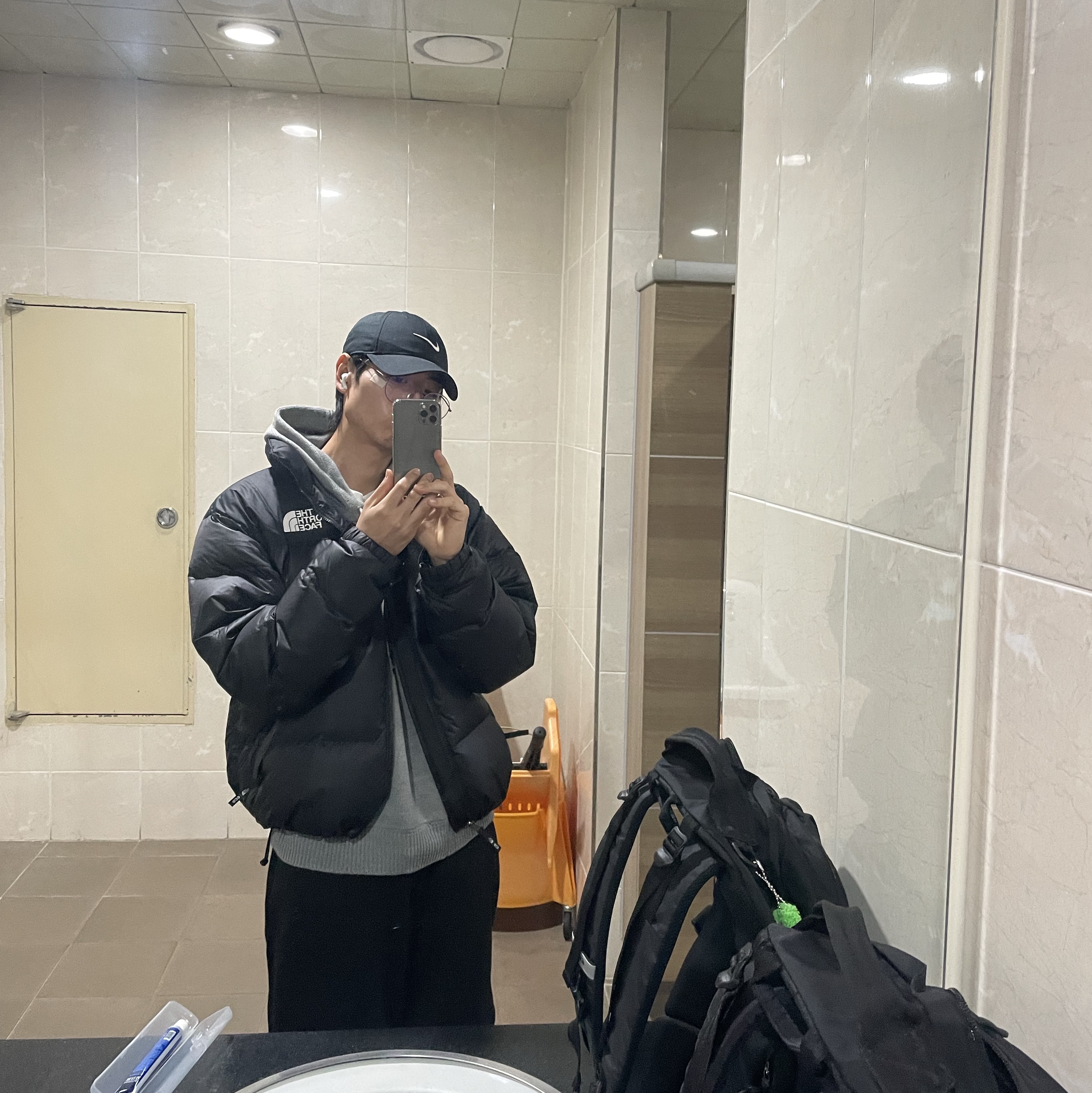 The North Face 1996 Retro Nuptse Jacket Black 착용 스타일
