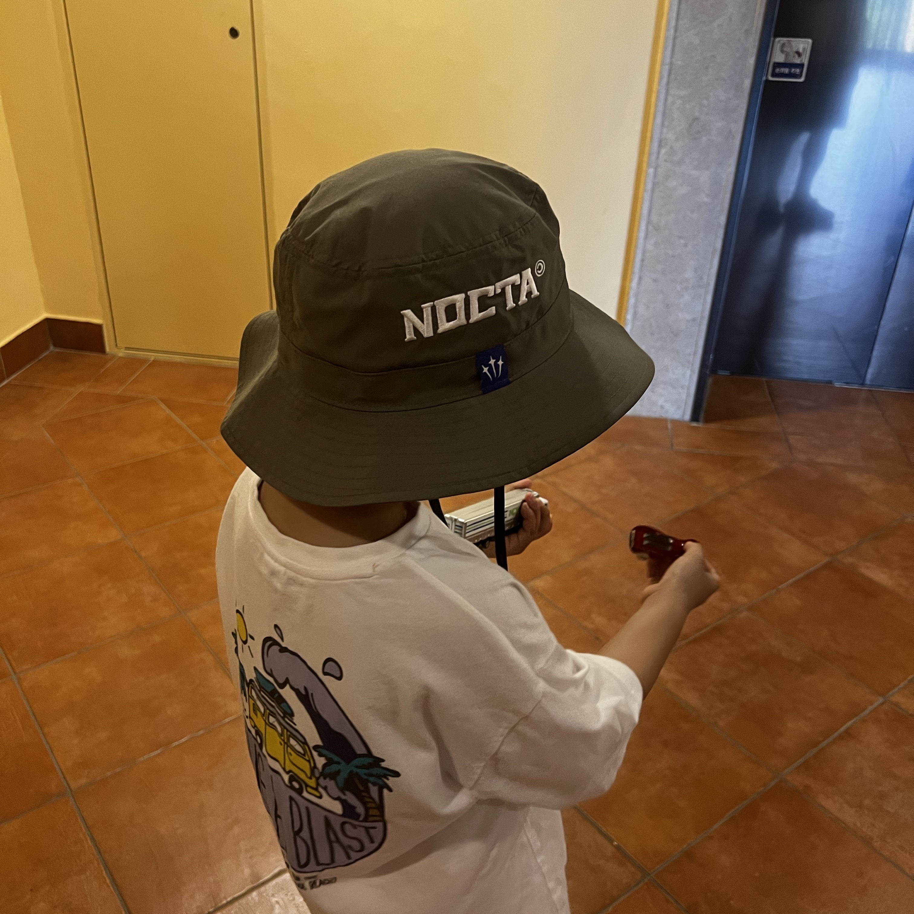 Nike x Drake Nocta Souvenir Cactus Bucket Hat Olive 착용 스타일