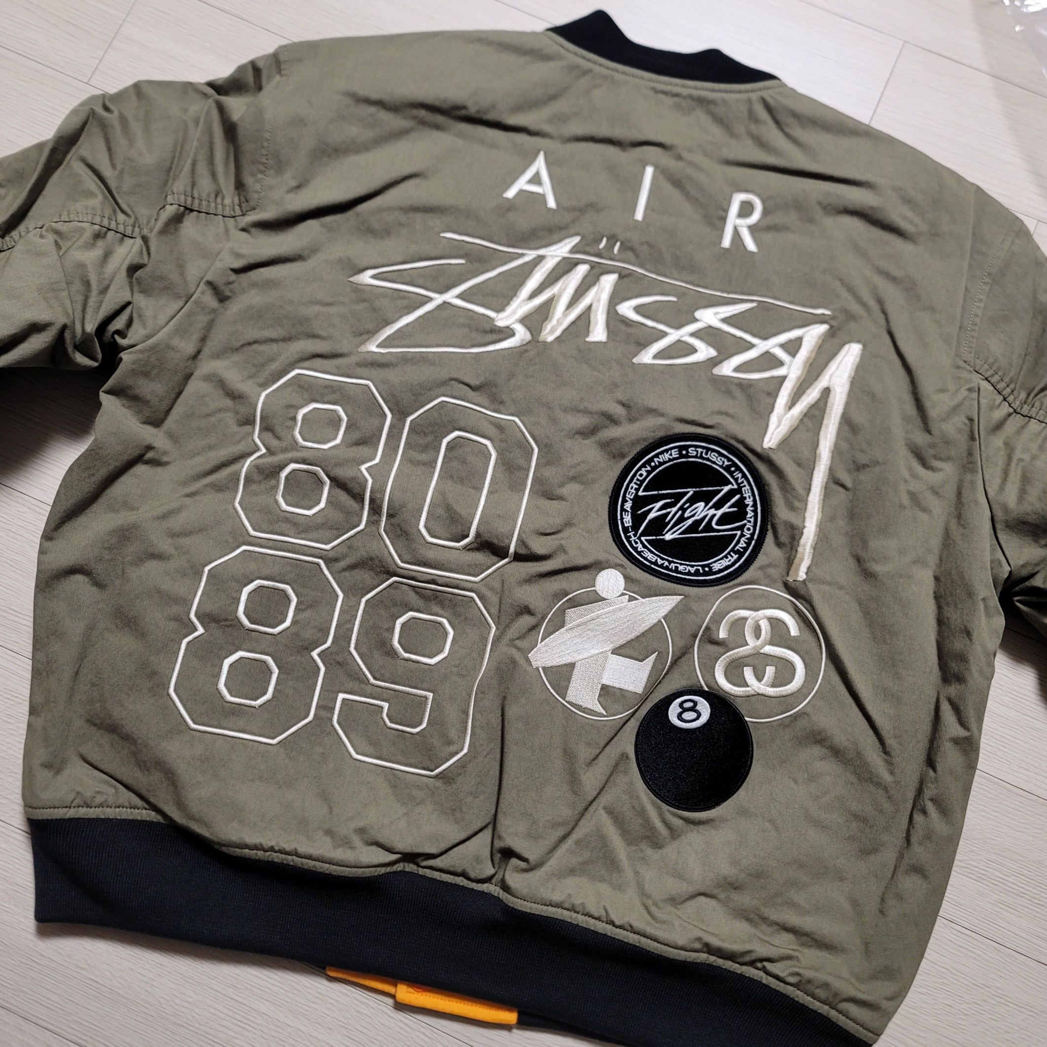 Nike x Stussy Reversible Jacket Medium Olive (FJ9153-222) 착용 스타일 - 1