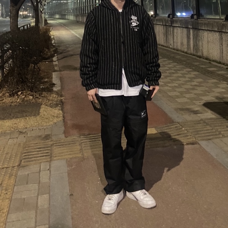 Nike x Stussy NRG Striped Wool Jacket Black (DR4023-010), Nike x Stussy NRG FL Storm-Fit Pants Black (DO7170-010) 착용 스타일