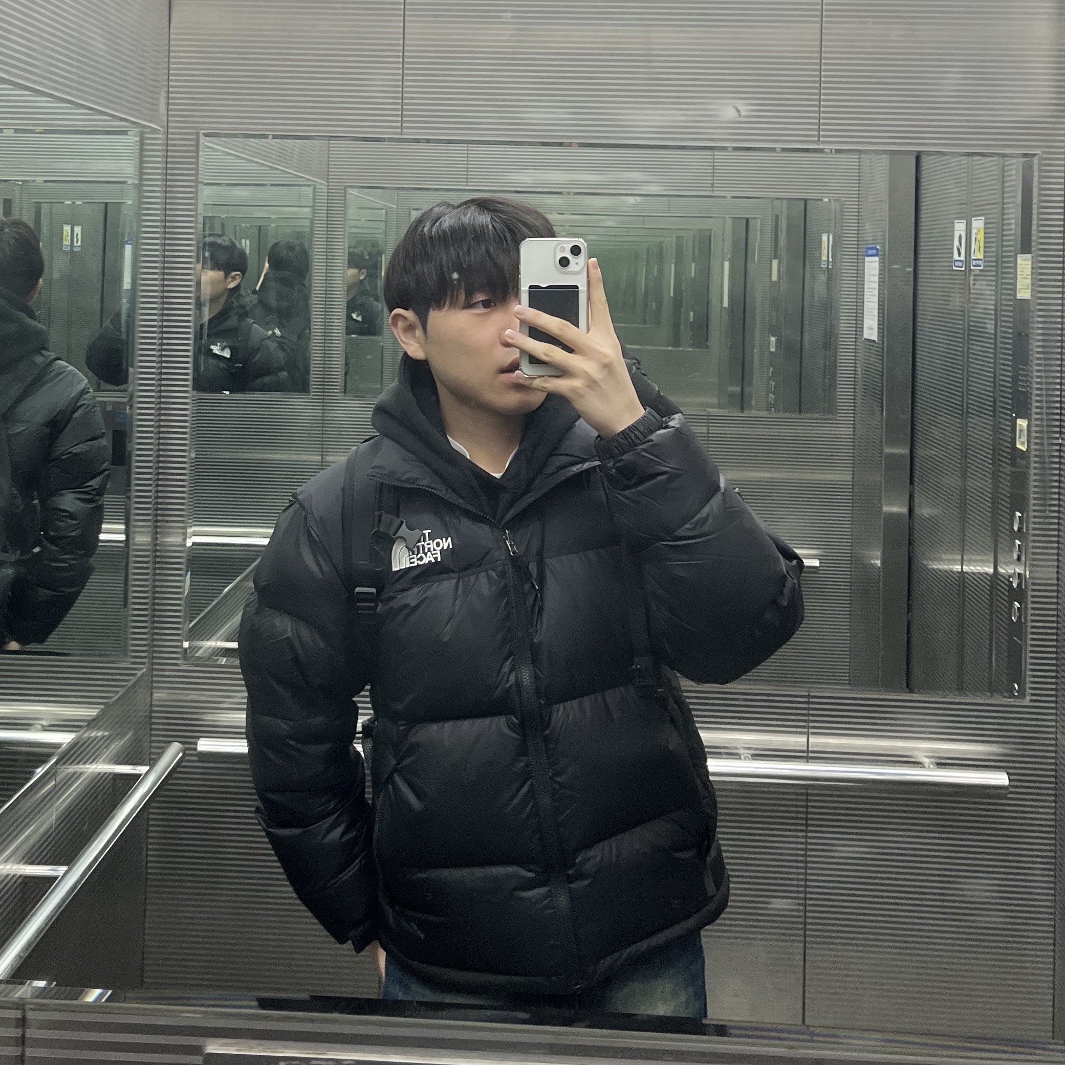 The North Face 1996 Eco Nuptse Jacket Black 착용 스타일