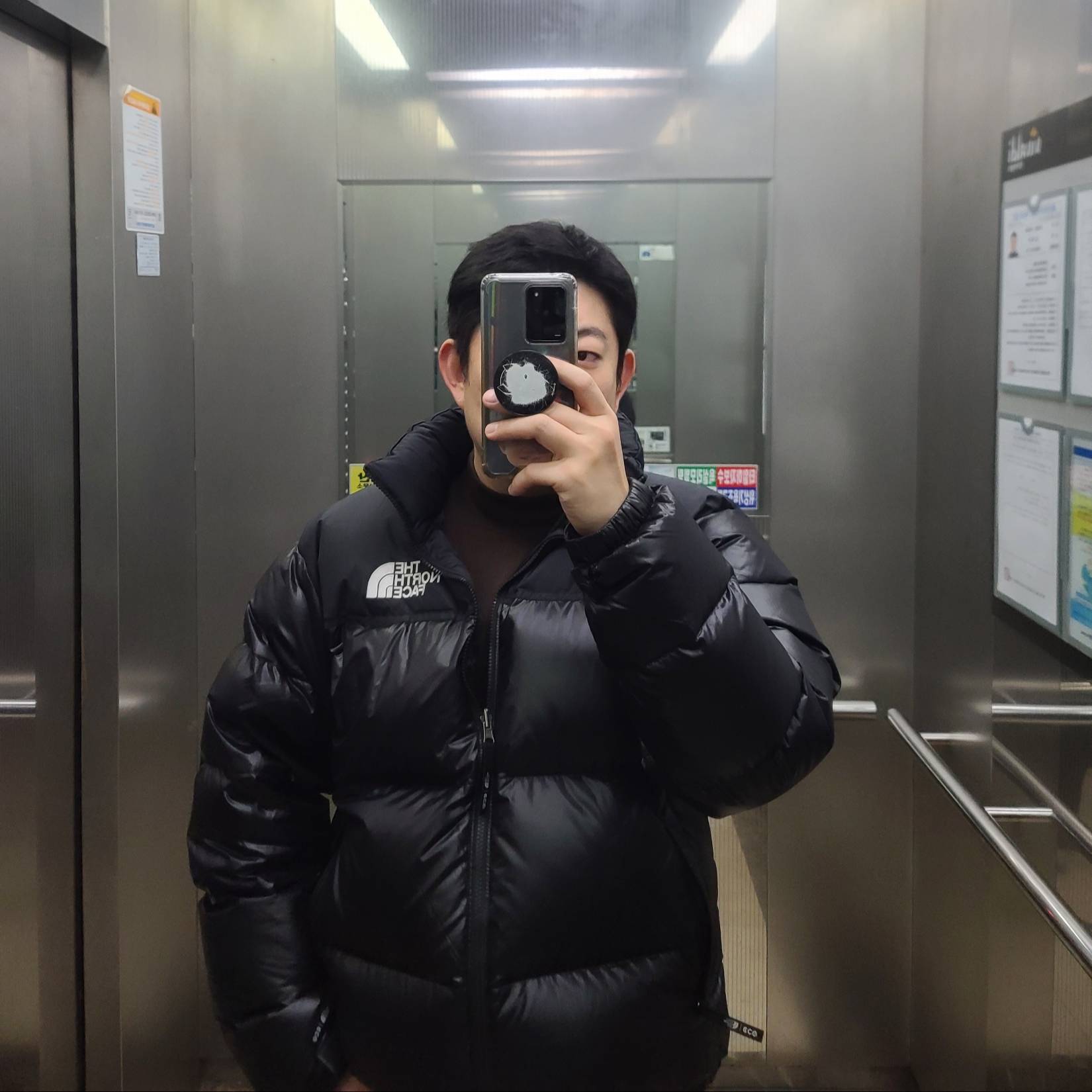 The North Face 1996 Eco Nuptse Jacket Real Black 착용 스타일