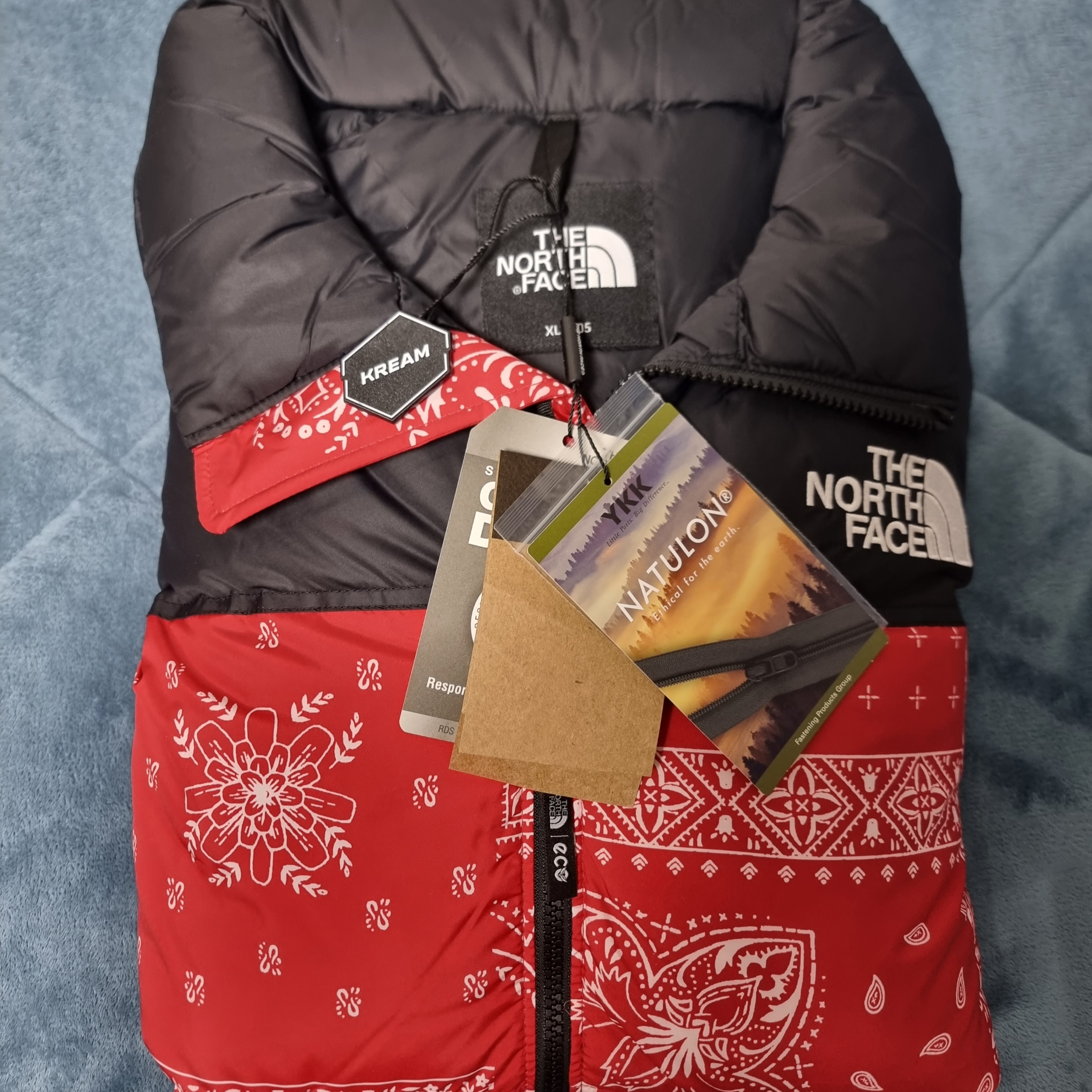 The North Face 1996 Novelty Nuptse Jacket Rio Red 착용 스타일