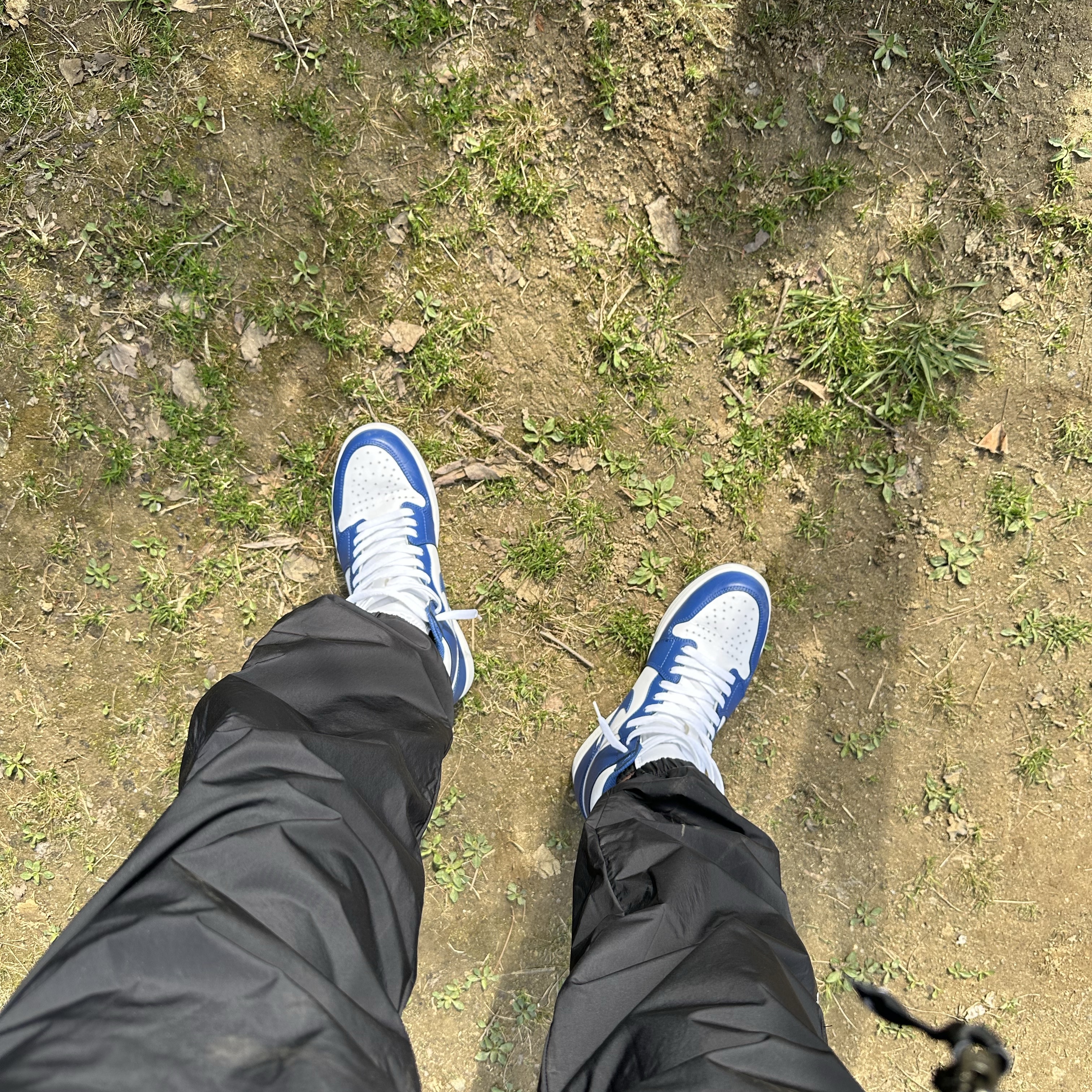 Jordan 1 Retro Storm Blue, Nike x Drake Nocta Woven Track Pants Black (FN7668-010) 착용 스타일 - 1