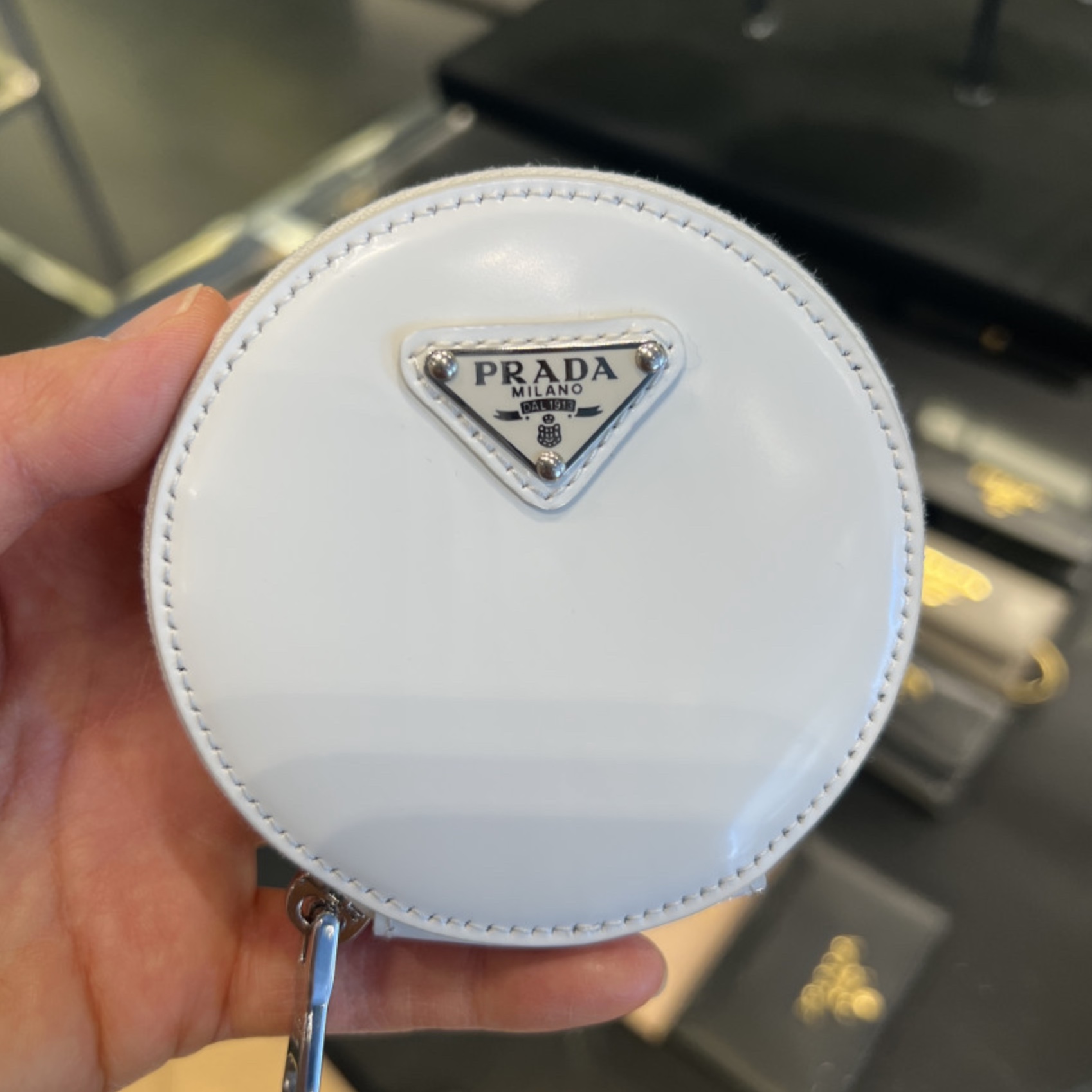 Prada Brushed Leather Round Mini-Pouch White 착용 스타일