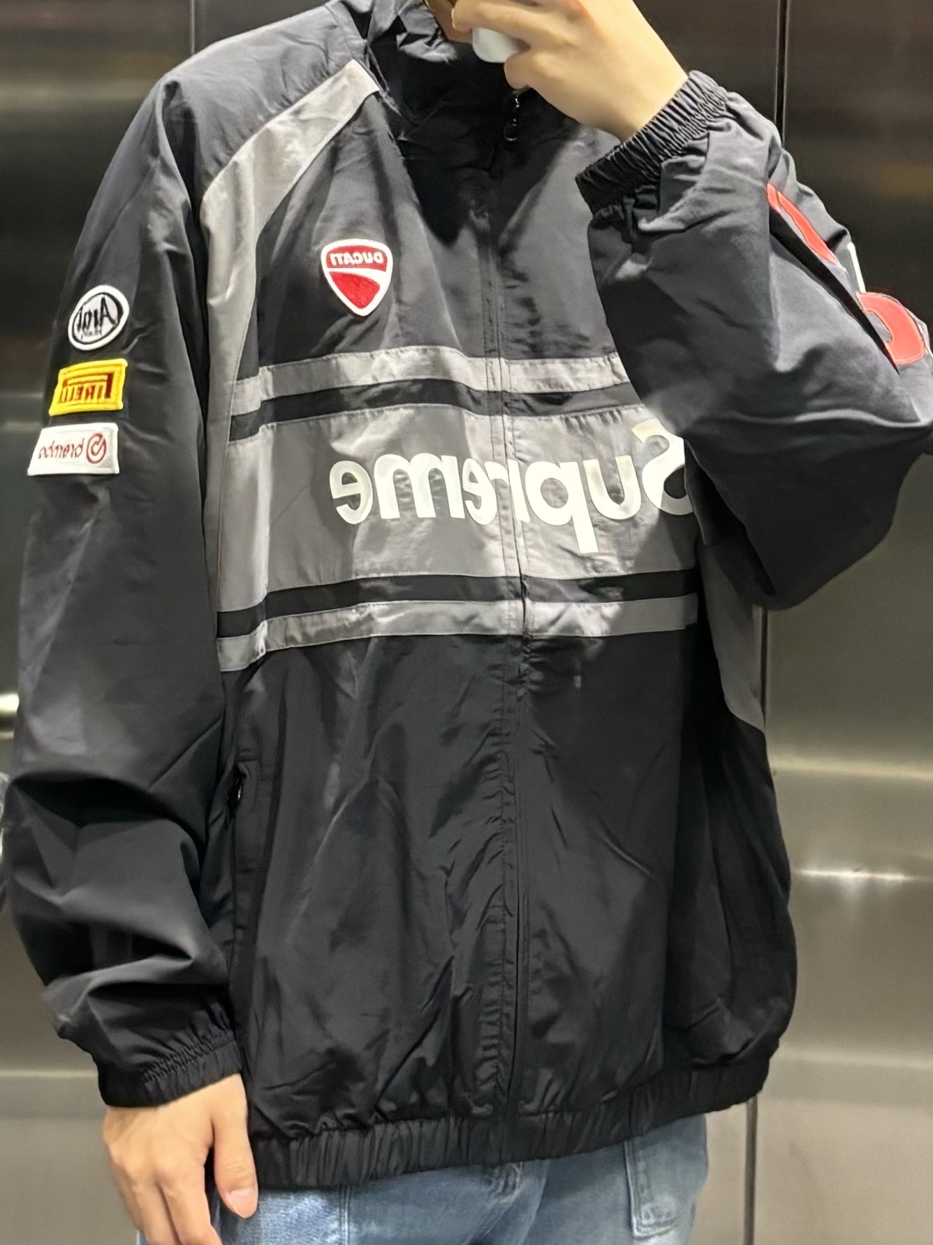 Supreme x Ducati Hooded Racing Jacket Black - 24SS, Supreme x Ducati Track Jacket Black - 24SS 착용 스타일 - 2