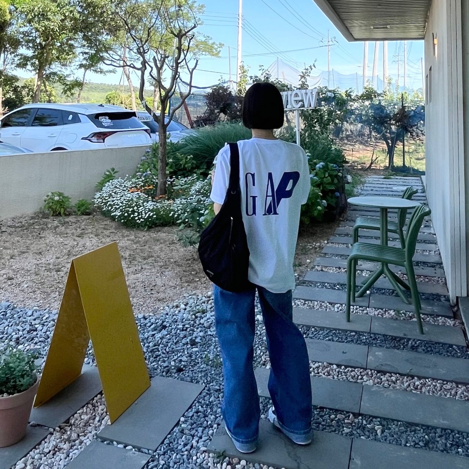 Palace x Gap T-Shirt White - 24SS, Prada Re-Nylon and Leather Shoulder Strap Backpack Black 착용 스타일