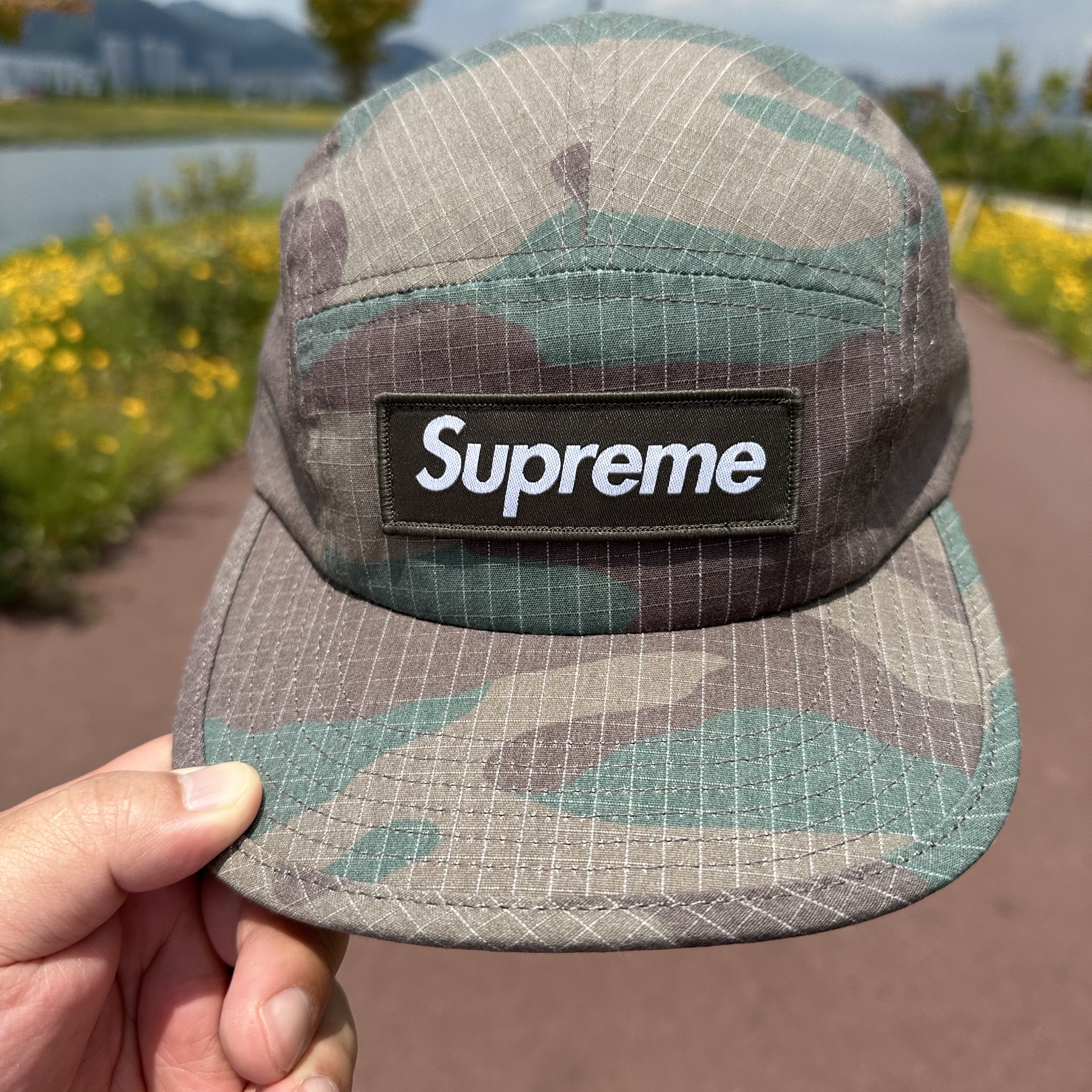 Supreme Reflective Ripstop Camp Cap Woodland Camo - 24SS 착용 스타일