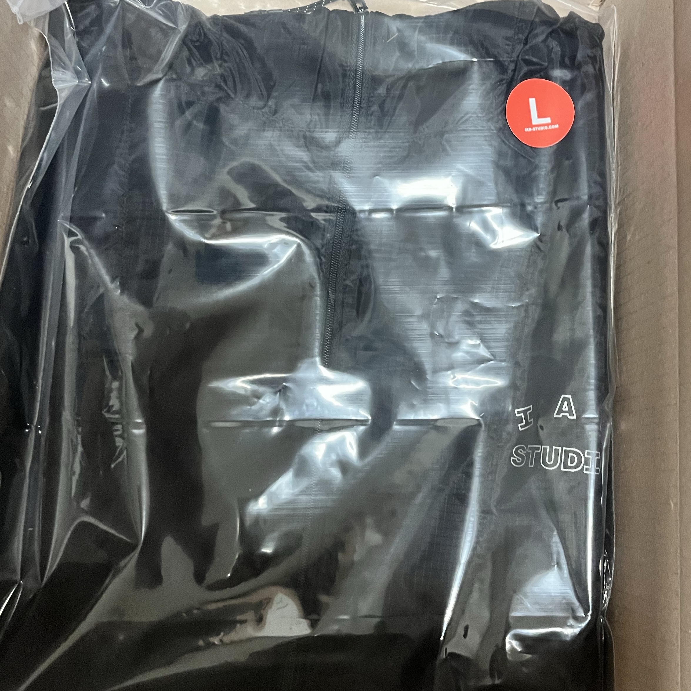 IAB Studio Ripstop Wind Jacket Black 착용 스타일