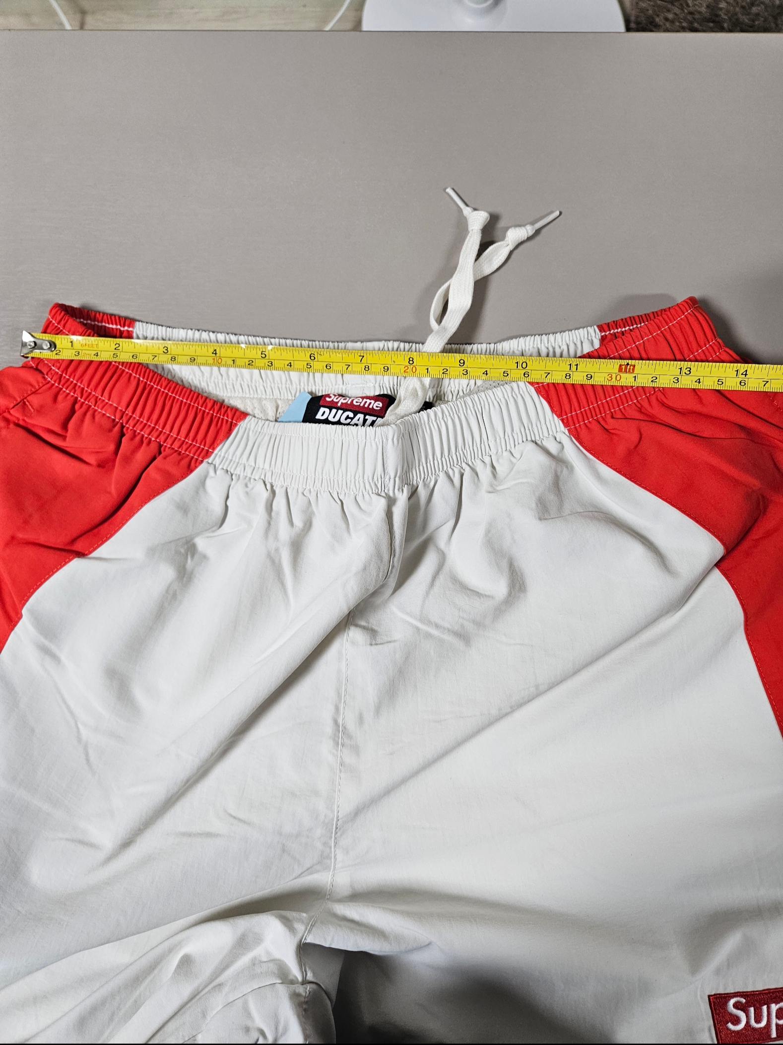 Supreme x Ducati Track Pants Light Grey - 24SS, Supreme x Ducati Logos T-Shirt Red - 24SS 착용 스타일 - 6