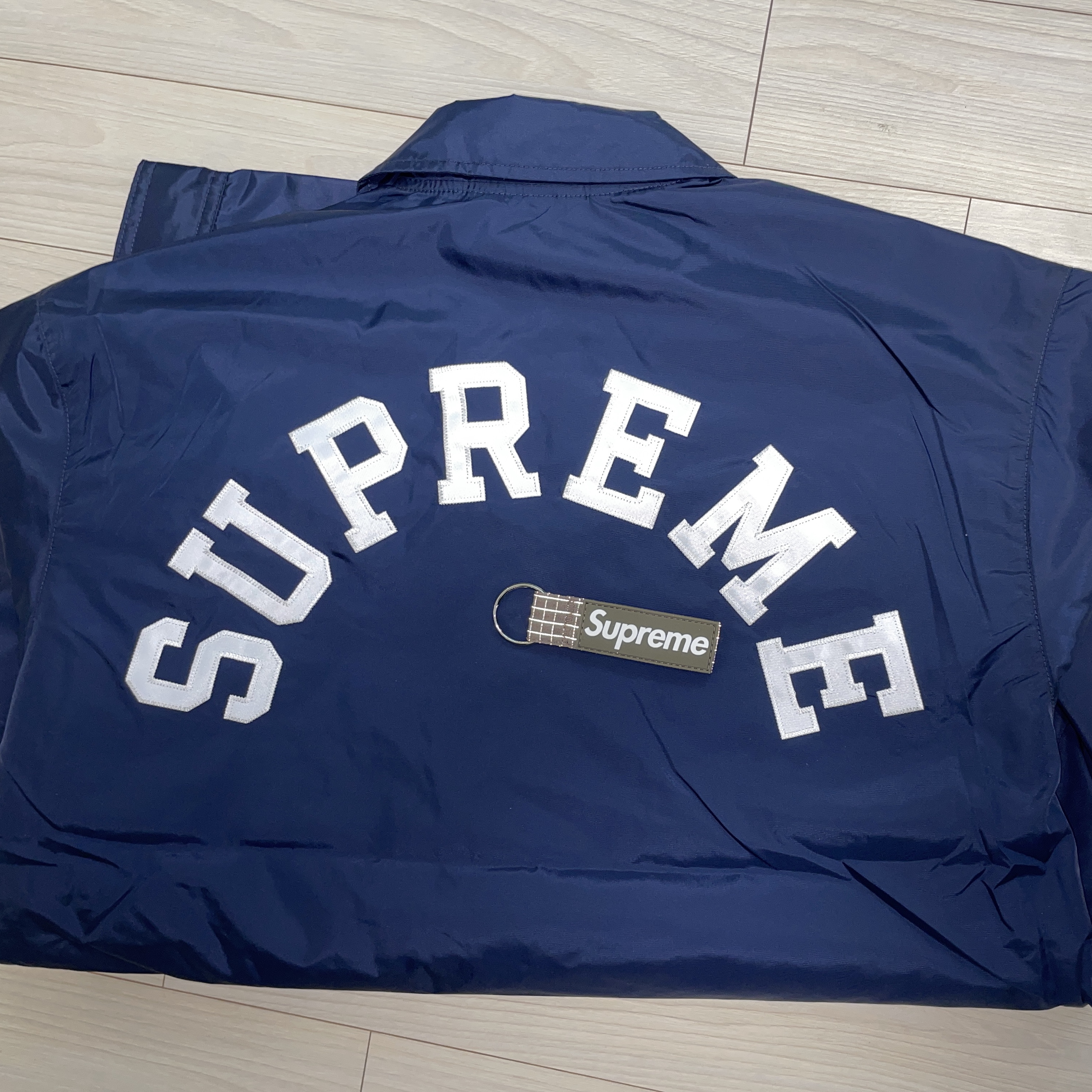 Supreme x Champion Coaches Jacket Navy - 24SS, Supreme Ripstop Keychain Woodland Camo - 24SS 착용 스타일