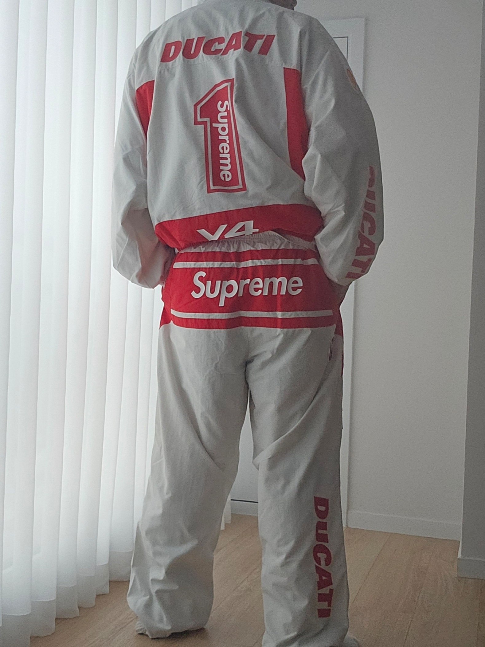 Supreme x Ducati Track Jacket Light Grey - 24SS, Supreme x Ducati Track Pants Light Grey - 24SS 착용 스타일 - 5