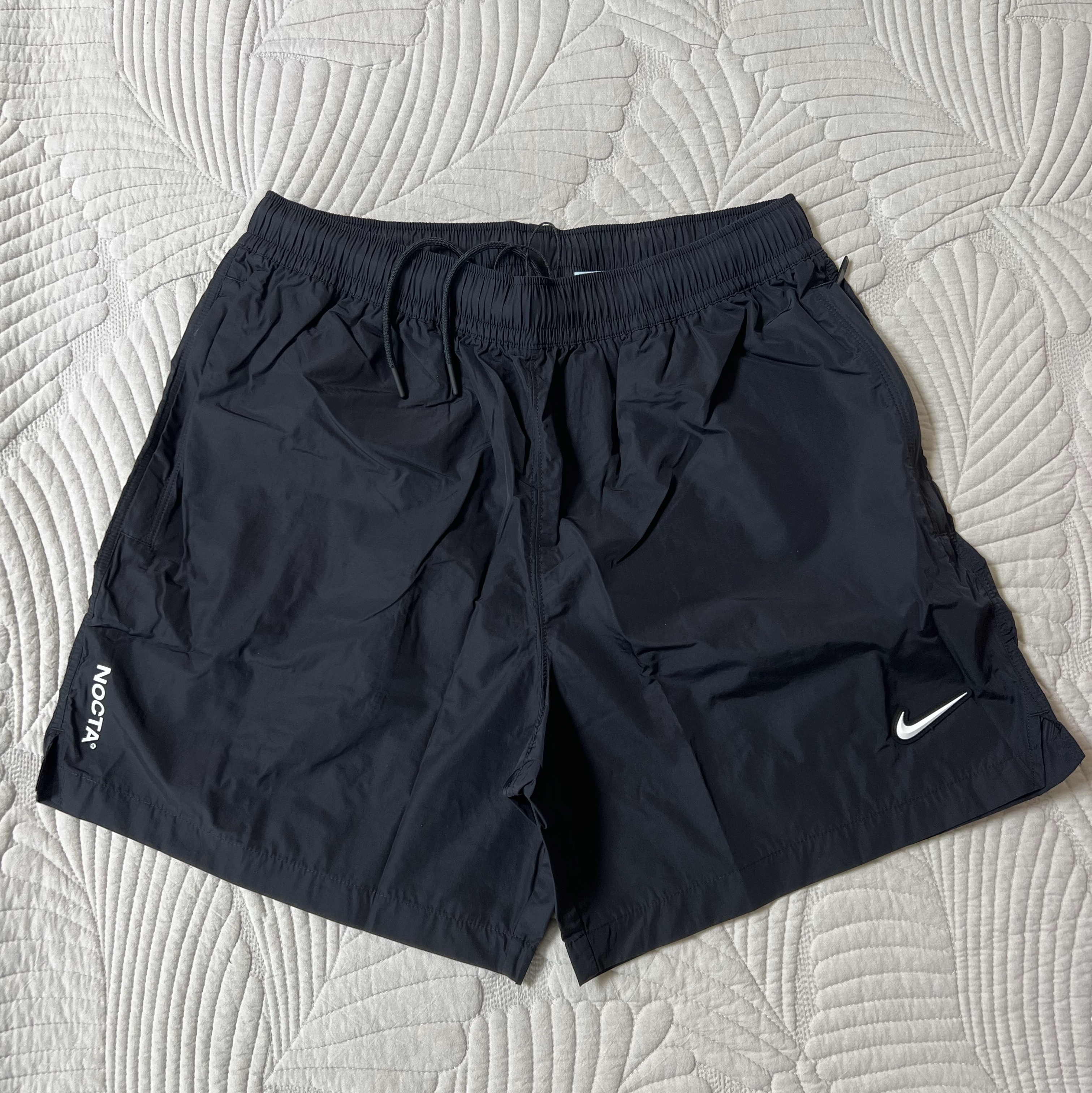 Nike x Drake Nocta Nylon Woven Shorts Black (FN8194-010) 착용 스타일 - 1