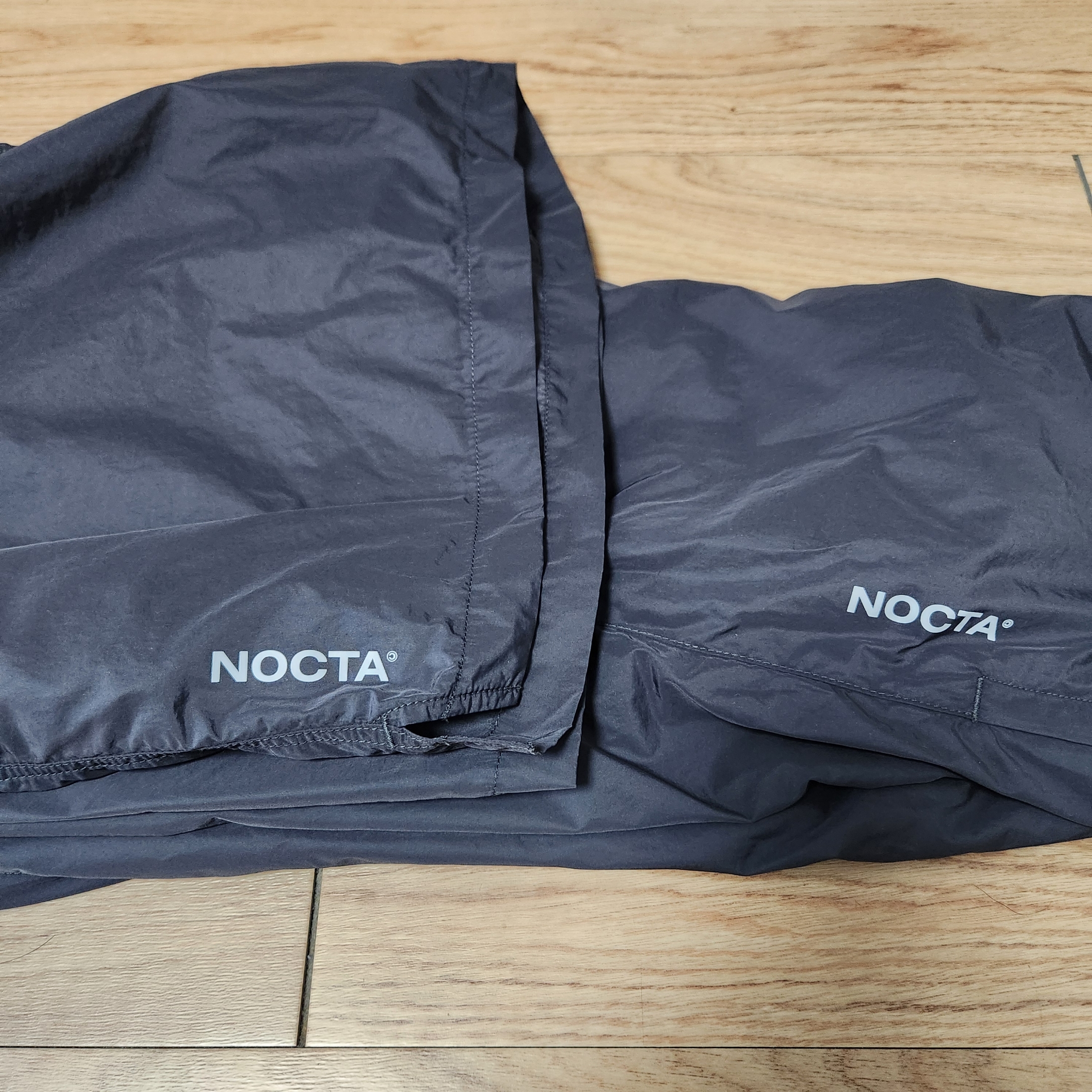 Nike x Drake Nocta Woven Track Pants Anthracite (FN7668-060), Nike x Drake Nocta Woven Shorts Anthracite (FN8194-060) 착용 스타일