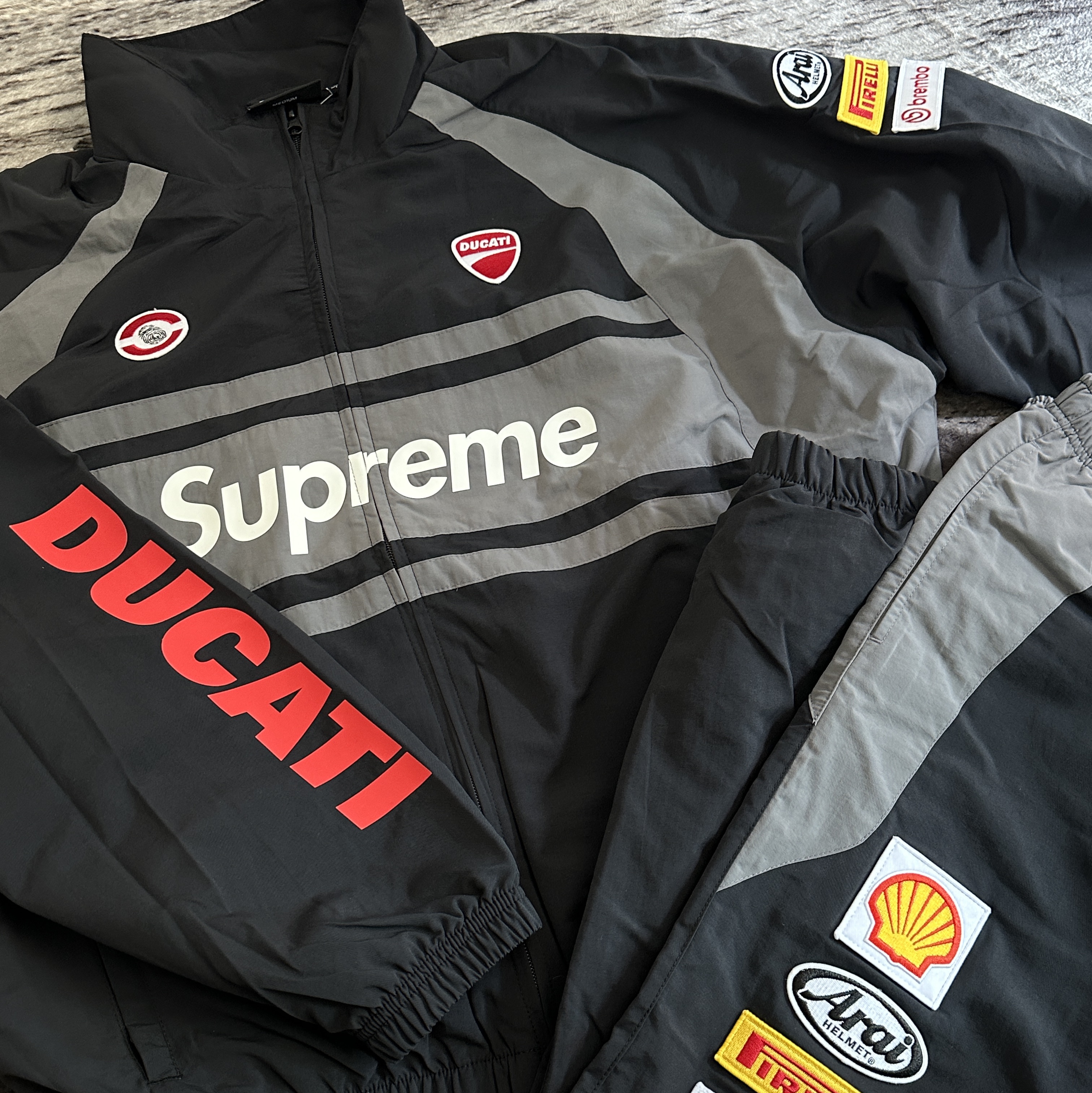 Supreme x Ducati Track Jacket Black - 24SS, Supreme x Ducati Track Pants Black - 24SS 착용 스타일