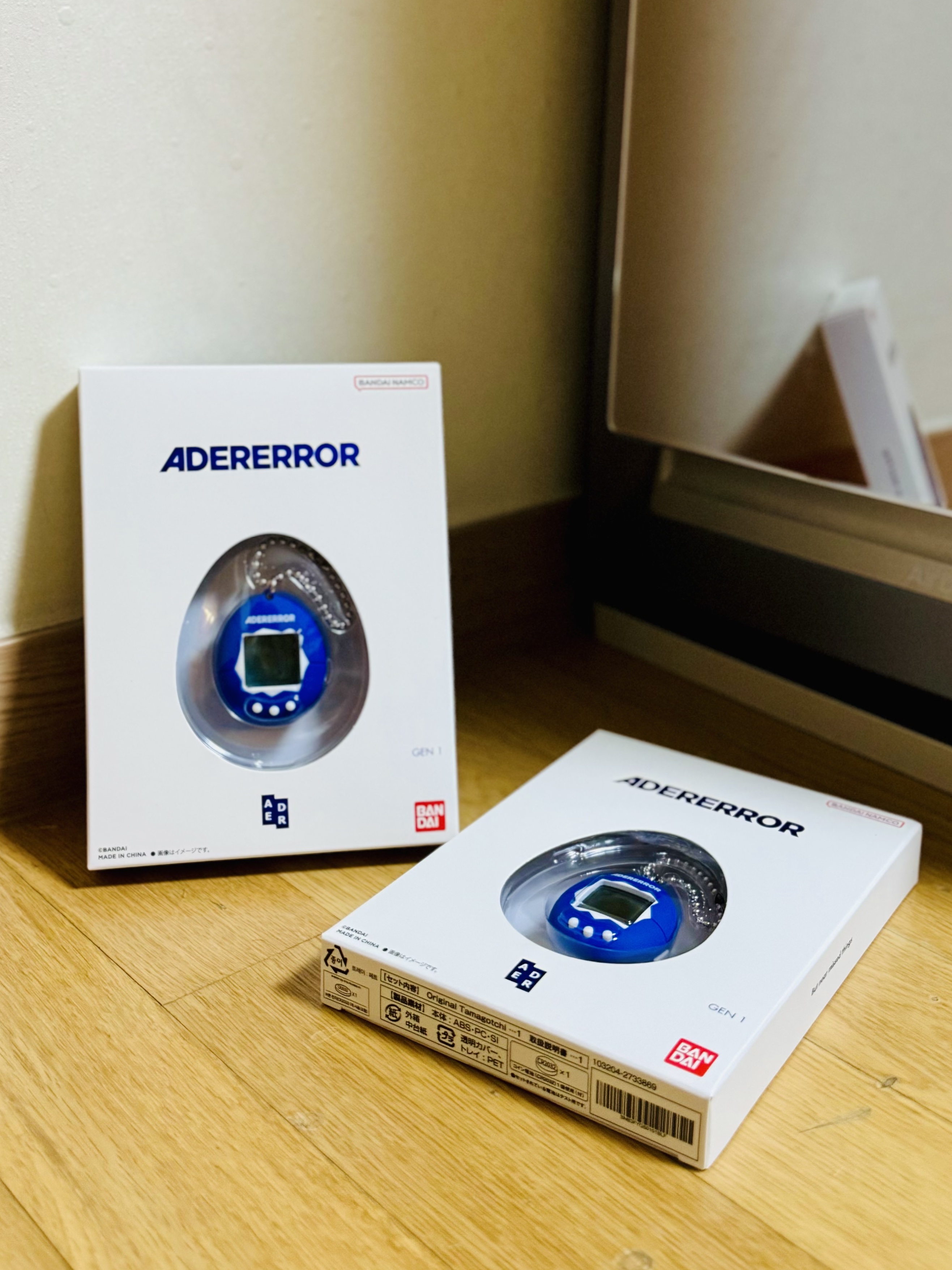Ader Error x Bandai Original Tamagotchi Z-Blue 착용 스타일