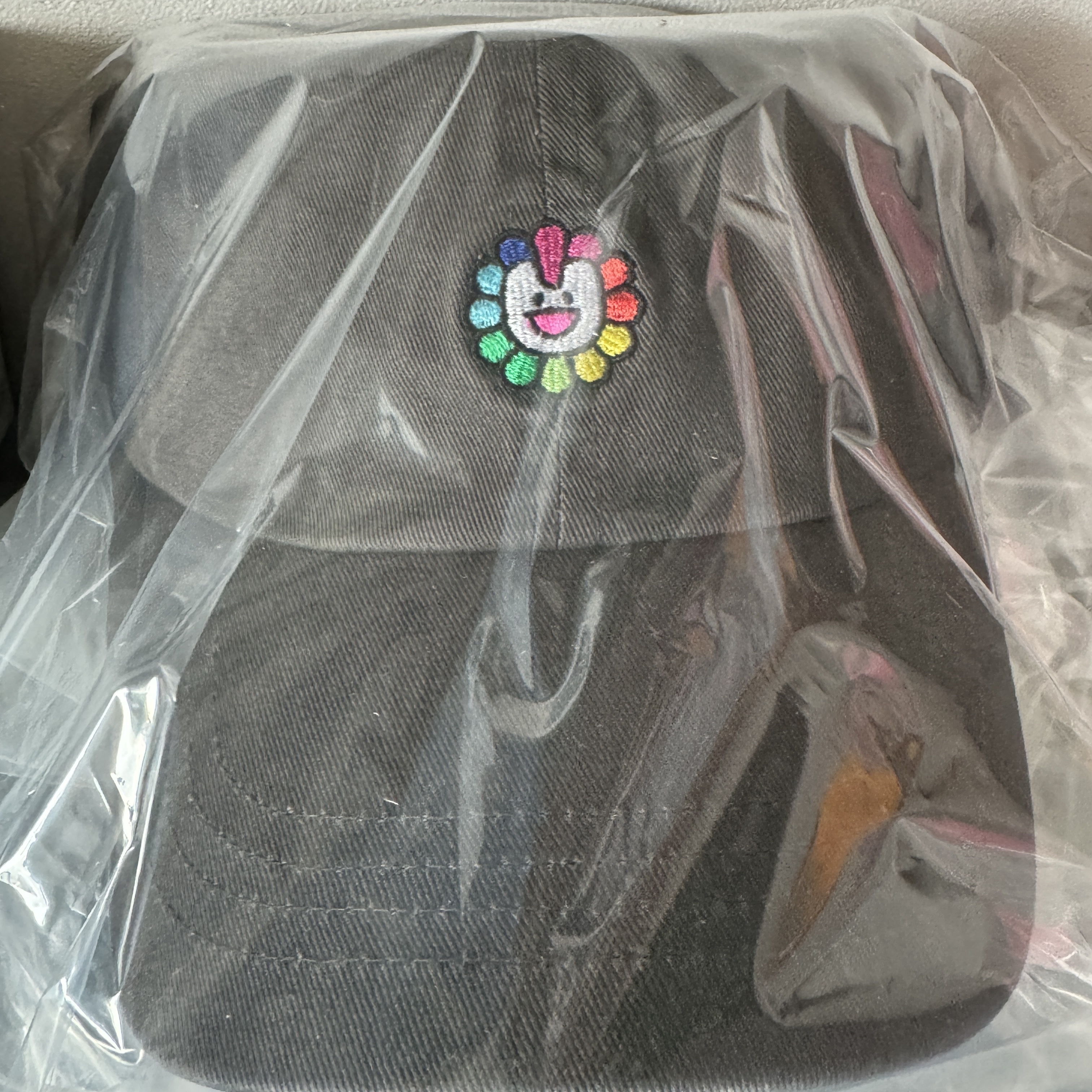 NewJeans x Murakami Baseball Cap Charcoal 착용 스타일