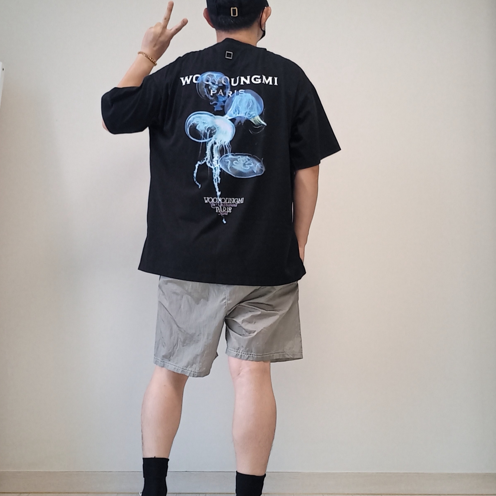 (W) Celine Triomphe Baseball Cap in Cotton Black, Wooyoungmi Luminous Jellyfish Back Logo T-Shirt Black - 24SS 착용 스타일 - 1