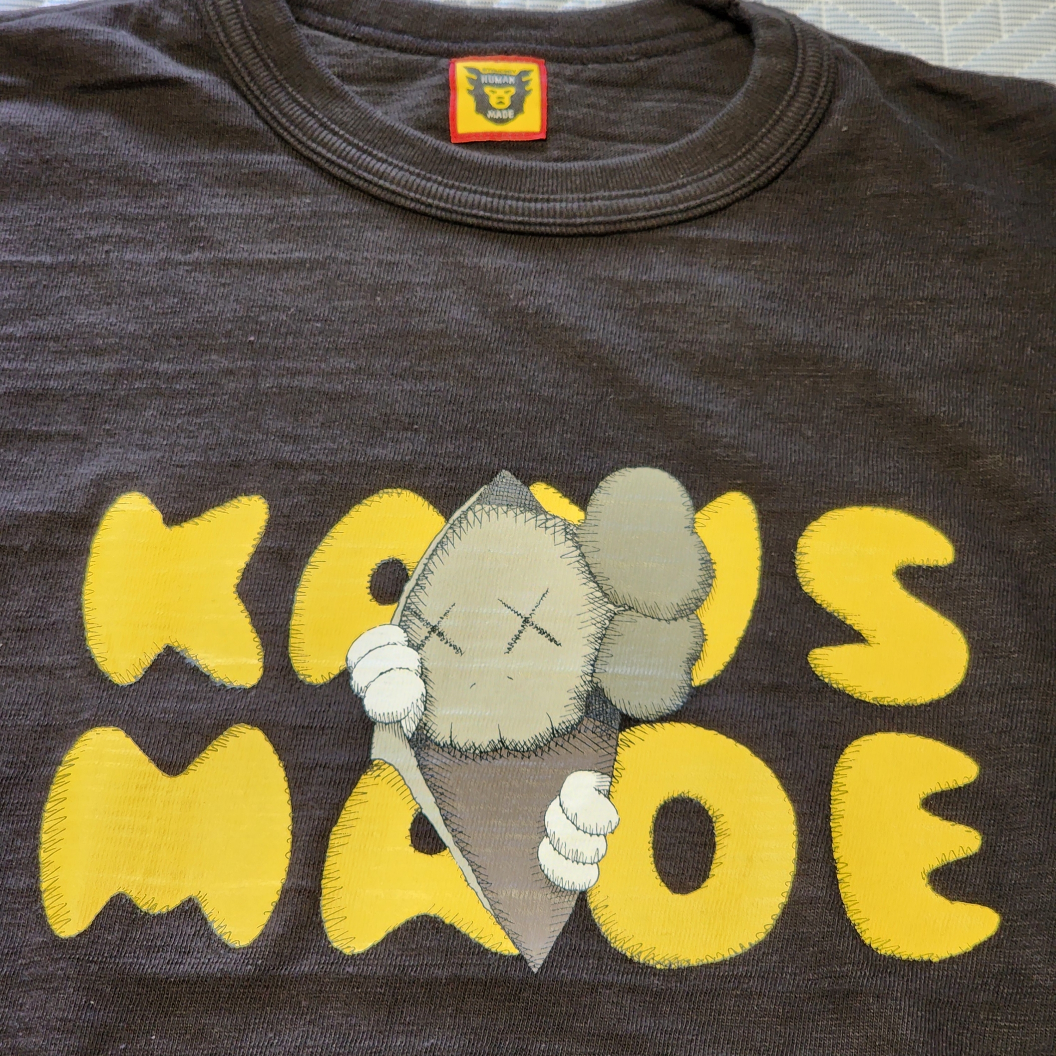 Human Made x Kaws Graphic T-Shirt #1 Black, Human Made Worksout 20th Anniversary Jindo Dog Graphic T-Shirt Black 착용 스타일 - 2