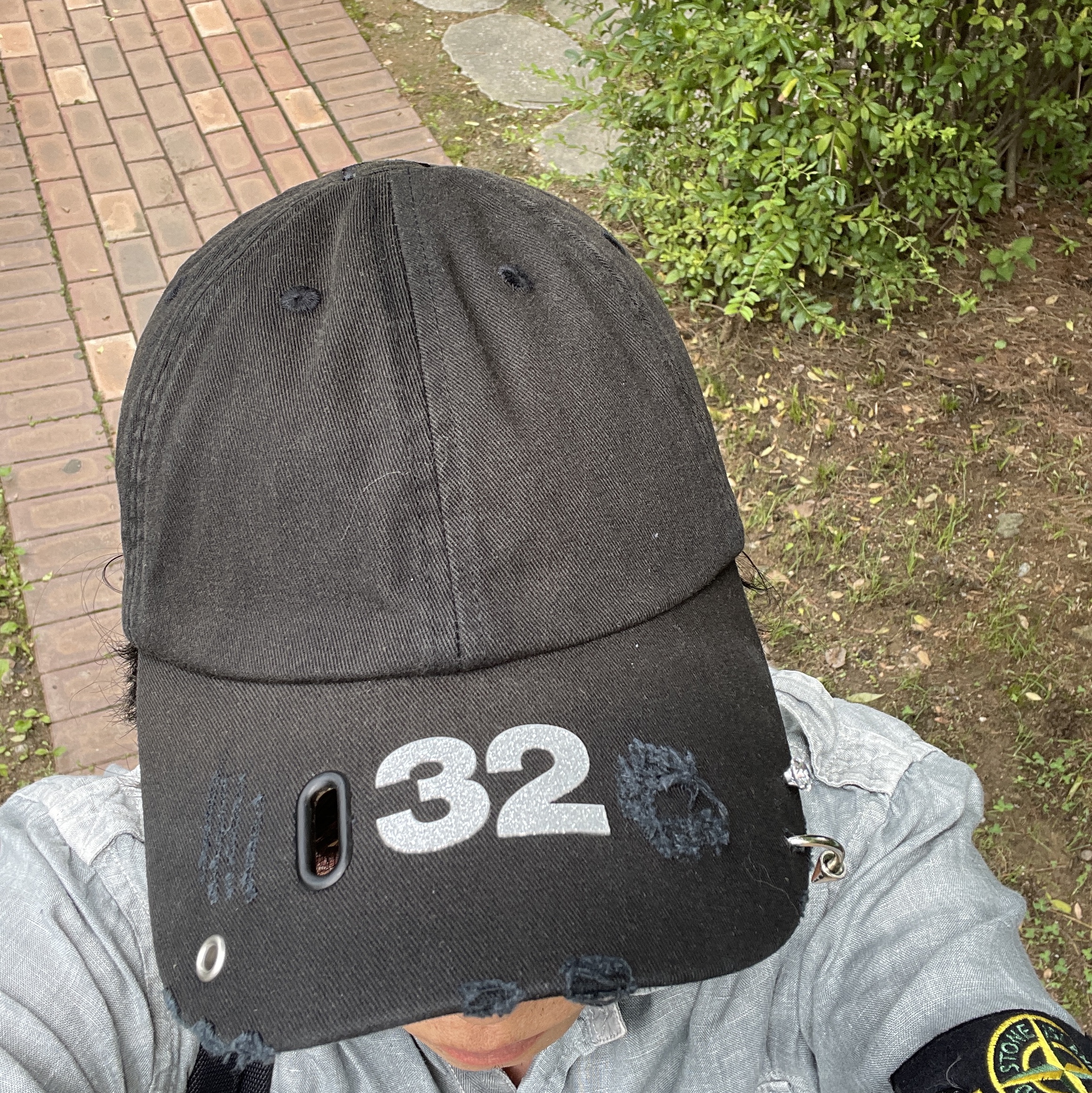 032c Multimedia Cap Washed Black 착용 스타일
