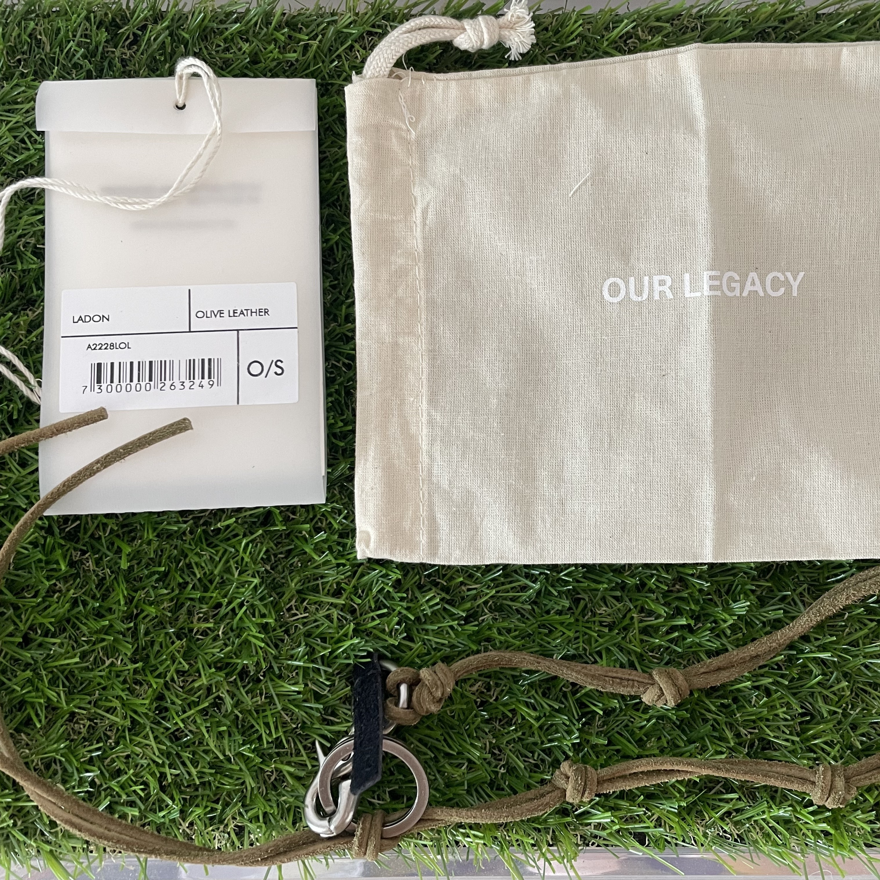 Our Legacy Ladon Leather Keychain Olive 착용 스타일